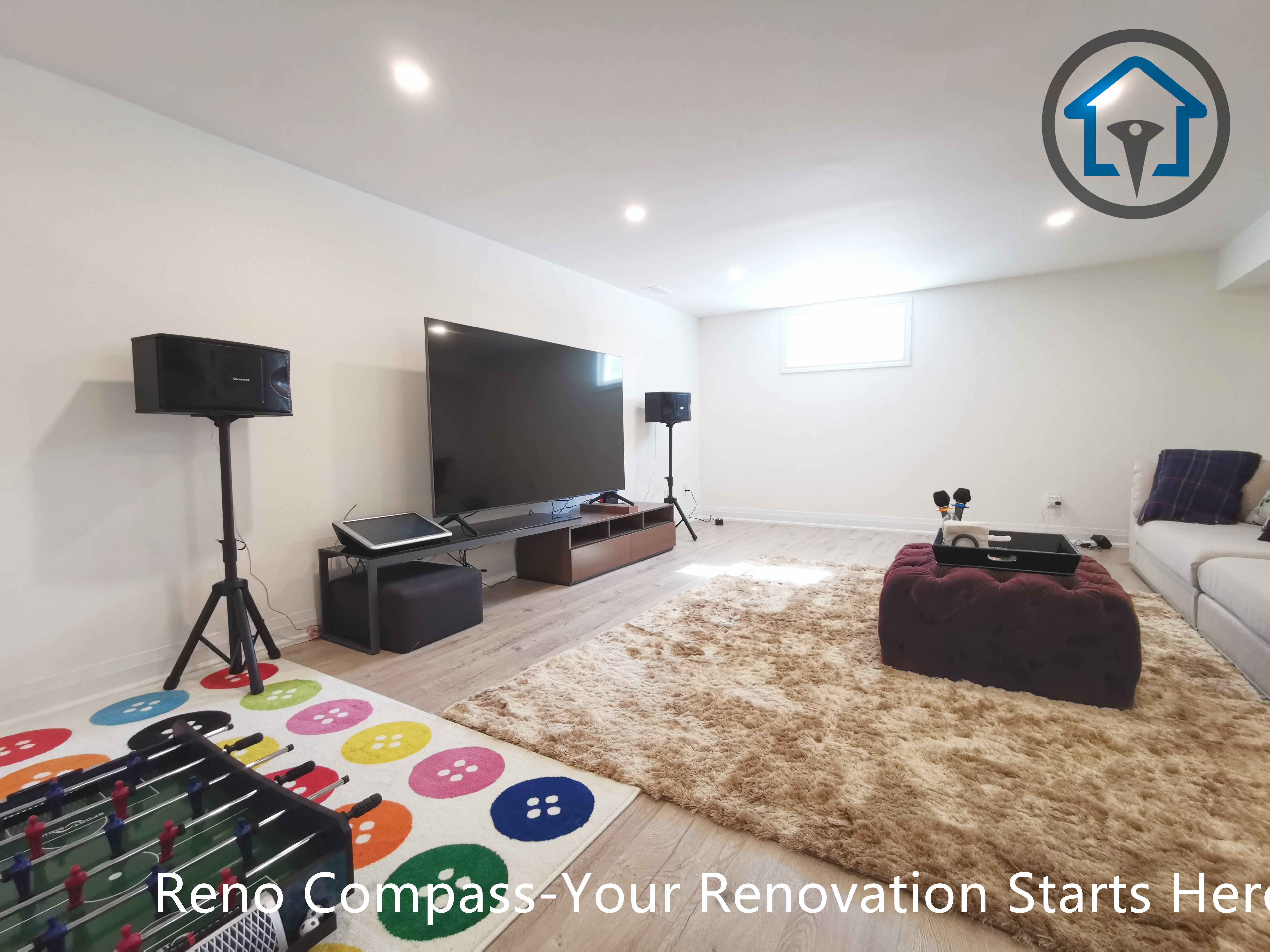 This North York basement renovation features a spacious family entertainment and media room designed for relaxation and recreation. The open layout, recessed ceiling lighting, and light-toned flooring create a bright and comfortable atmosphere, making the space ideal for movie nights, games, and everyday family use. Completed by a Toronto renovation company focused on functional basement design and quality craftsmanship.