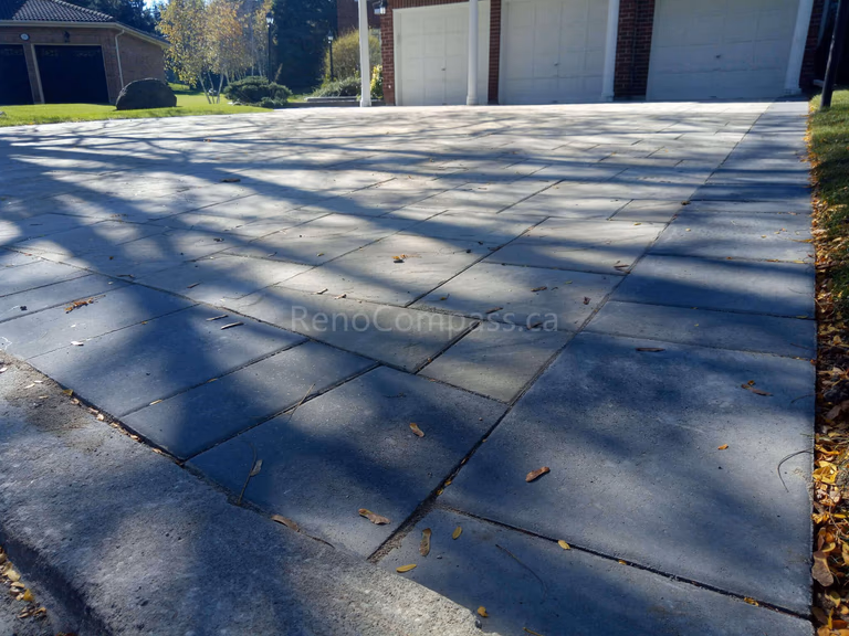 A stunning custom interlocking driveway designed and installed in Aurora by Reno Compass. Featuring precision stone alignment, clean edges, and a durable surface that enhances both function and curb appeal. Perfect for luxury homes and modern landscaping projects in the Greater Toronto Area.