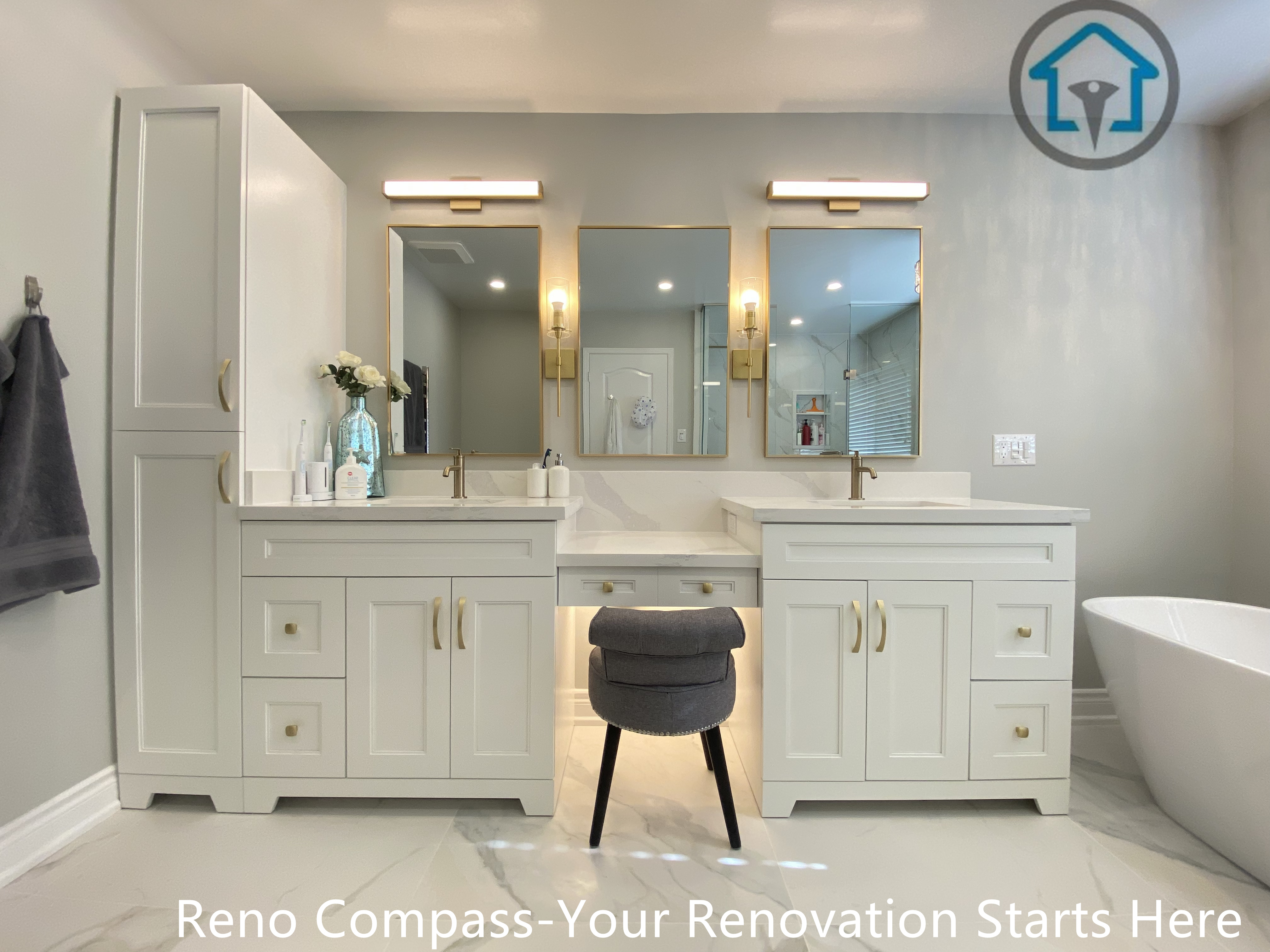 This Mississauga bathroom renovation features a symmetrical double vanity design with custom cabinetry, integrated makeup seating, and warm gold-tone fixtures. Dual mirrors with wall-mounted lighting enhance both functionality and visual balance, making the space ideal for shared daily use. The neutral color palette, paired with marble-look flooring, creates a bright and refined atmosphere while maintaining durability. Thoughtful storage planning and precise installation help ensure long-term practicality and a clean, timeless finish.