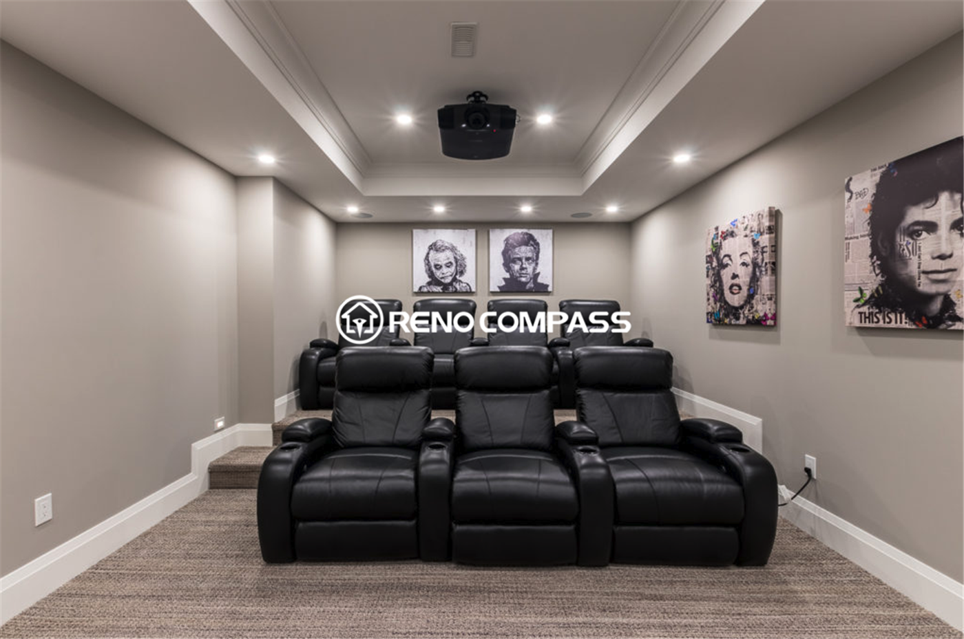 Luxury basement home theater renovation in Toronto featuring a custom cinema room with tiered seating, leather recliners, recessed lighting, and ceiling-mounted projector system. This professionally designed entertainment space was completed by a trusted Toronto renovation company, Reno Compass Inc., creating a premium movie experience at home.