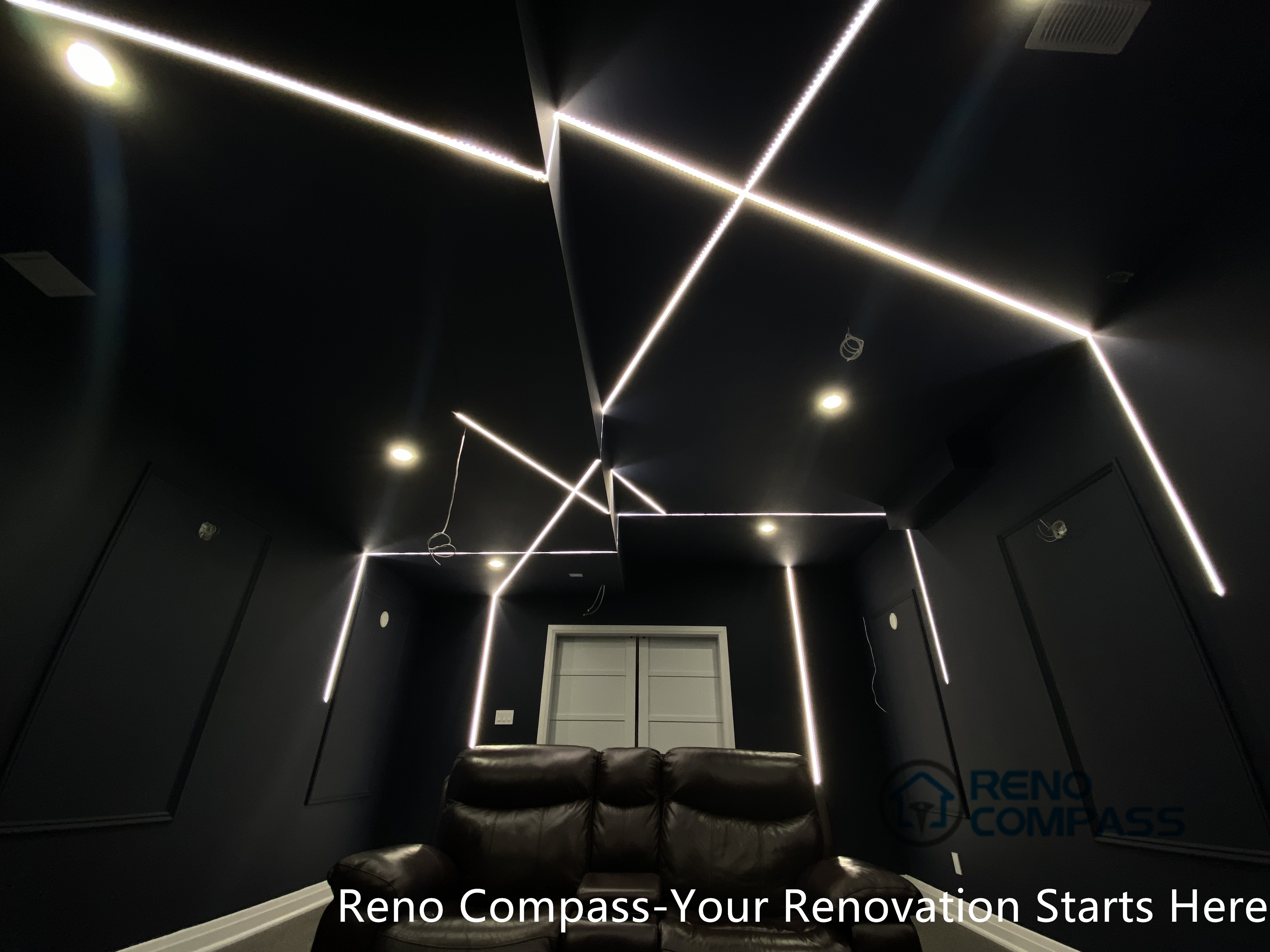 This Newmarket basement home theater renovation features a modern dark-tone design with custom recessed LED ceiling lighting, acoustic wall panels, and a dedicated media seating layout. Designed and built by an experienced Toronto renovation company, this basement transformation delivers a cinematic atmosphere while maintaining comfort, clean lines, and functional lighting control—ideal for family entertainment and private movie nights.