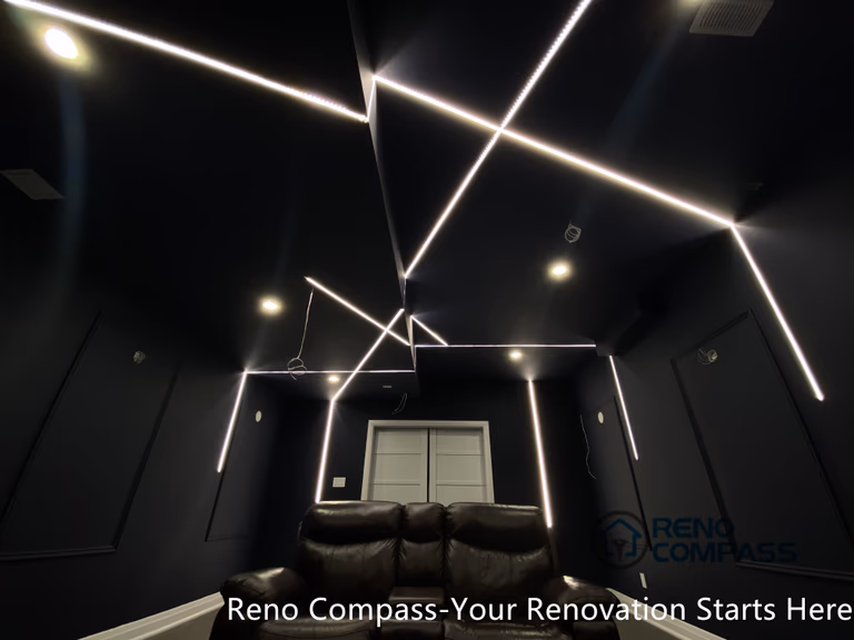 This Newmarket basement home theater renovation features a modern dark-tone design with custom recessed LED ceiling lighting, acoustic wall panels, and a dedicated media seating layout. Designed and built by an experienced Toronto renovation company, this basement transformation delivers a cinematic atmosphere while maintaining comfort, clean lines, and functional lighting control—ideal for family entertainment and private movie nights.