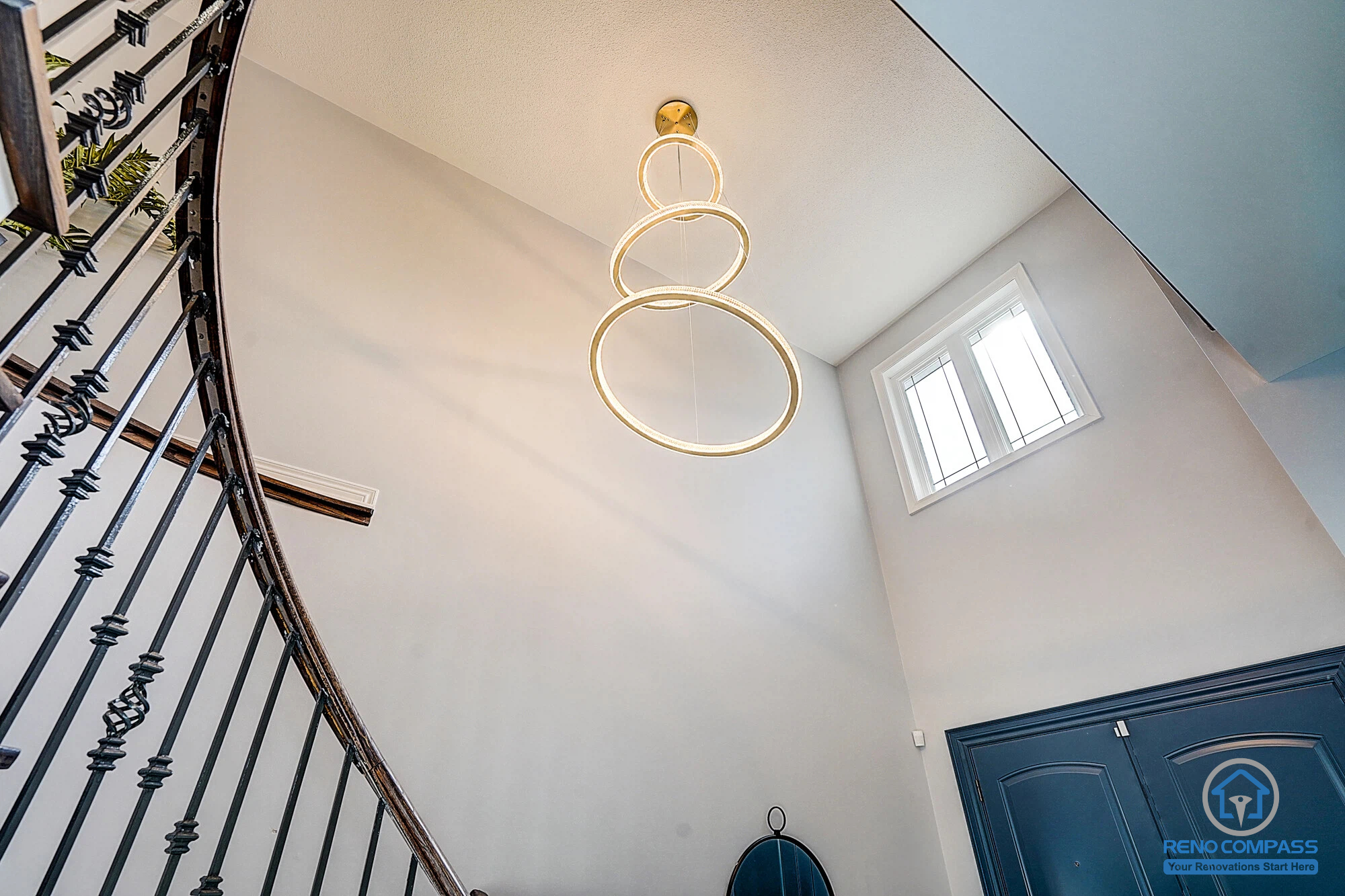 This Vaughan Maple renovation features a dramatic high-ceiling staircase with a modern chandelier and upgraded lighting design. Combined with staircase refinishing, fresh paint, and pot lights, the entry space feels brighter and more luxurious. Completed by a trusted Toronto renovation company.