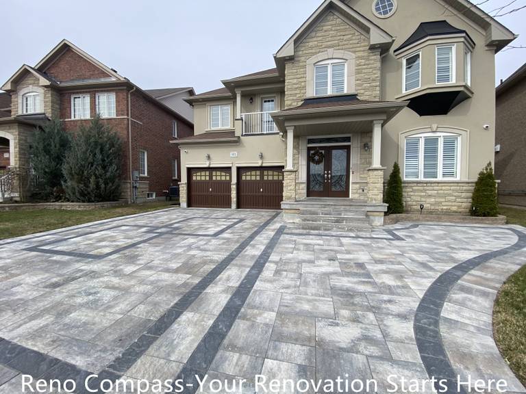 Completed interlocking driveway renovation in Newmarket featuring a large-scale front yard hardscape with patterned concrete pavers and contrasting border lines. The upgraded driveway enhances curb appeal, provides a durable parking surface, and complements the home’s exterior architecture. Designed and installed by a trusted Toronto renovation company specializing in high-quality residential exterior renovations.