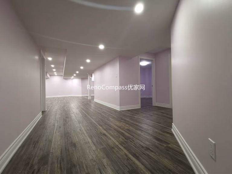 This Richmond Hill basement renovation features a spacious open-concept layout with modern recessed lighting, durable wood-look flooring, and soft neutral wall tones to create a bright and welcoming environment. Completed by a professional Toronto renovation company, the redesigned basement offers a versatile living area suitable for entertainment, rental potential, or extended family use. The clean layout and upgraded finishes enhance both functionality and overall property value.