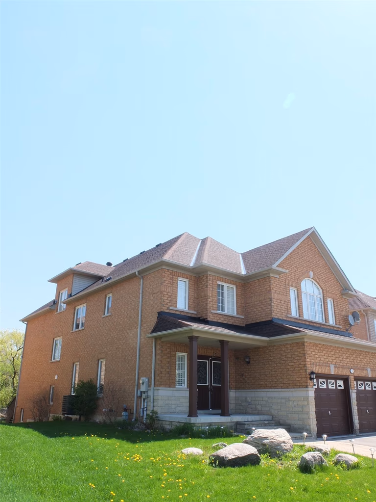 This image showcases a completed roofing renovation project in Richmond Hill, featuring a well-maintained residential home with an upgraded roof system. The project focuses on improving roof durability, weather resistance, and overall curb appeal. As a professional Toronto renovation company, Reno Compass Inc. provides high-quality roofing renovation services for homeowners across Richmond Hill and the Greater Toronto Area, ensuring long-term protection and enhanced property value.