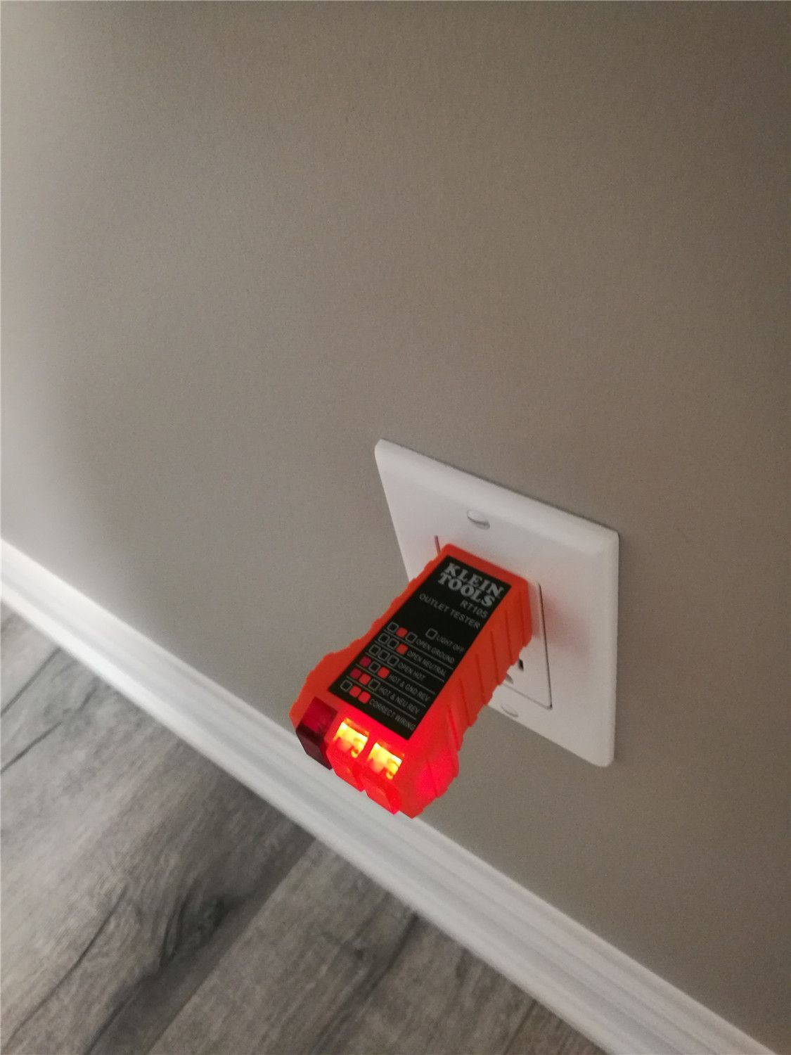 As part of this Markham basement renovation, electrical outlets were professionally installed and tested to ensure safety, reliability, and code compliance. This image highlights a completed power outlet inspection using a circuit tester, confirming proper wiring and functionality for the newly finished basement space. Careful attention to electrical details enhances everyday convenience while supporting modern lighting, entertainment systems, and appliances. A well-executed electrical upgrade is essential to any high-quality basement renovation, delivering both peace of mind and long-term performance for homeowners in Markham.