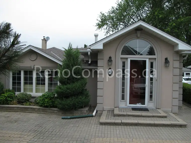 This image shows the exterior of a detached house undergoing a roofing renovation project in Vaughan, Greater Toronto Area. The roofing upgrade is designed to improve durability, weather resistance, and overall curb appeal. Completed by a professional Toronto Renovation Company, this roof renovation enhances both the protection and long-term value of the home.