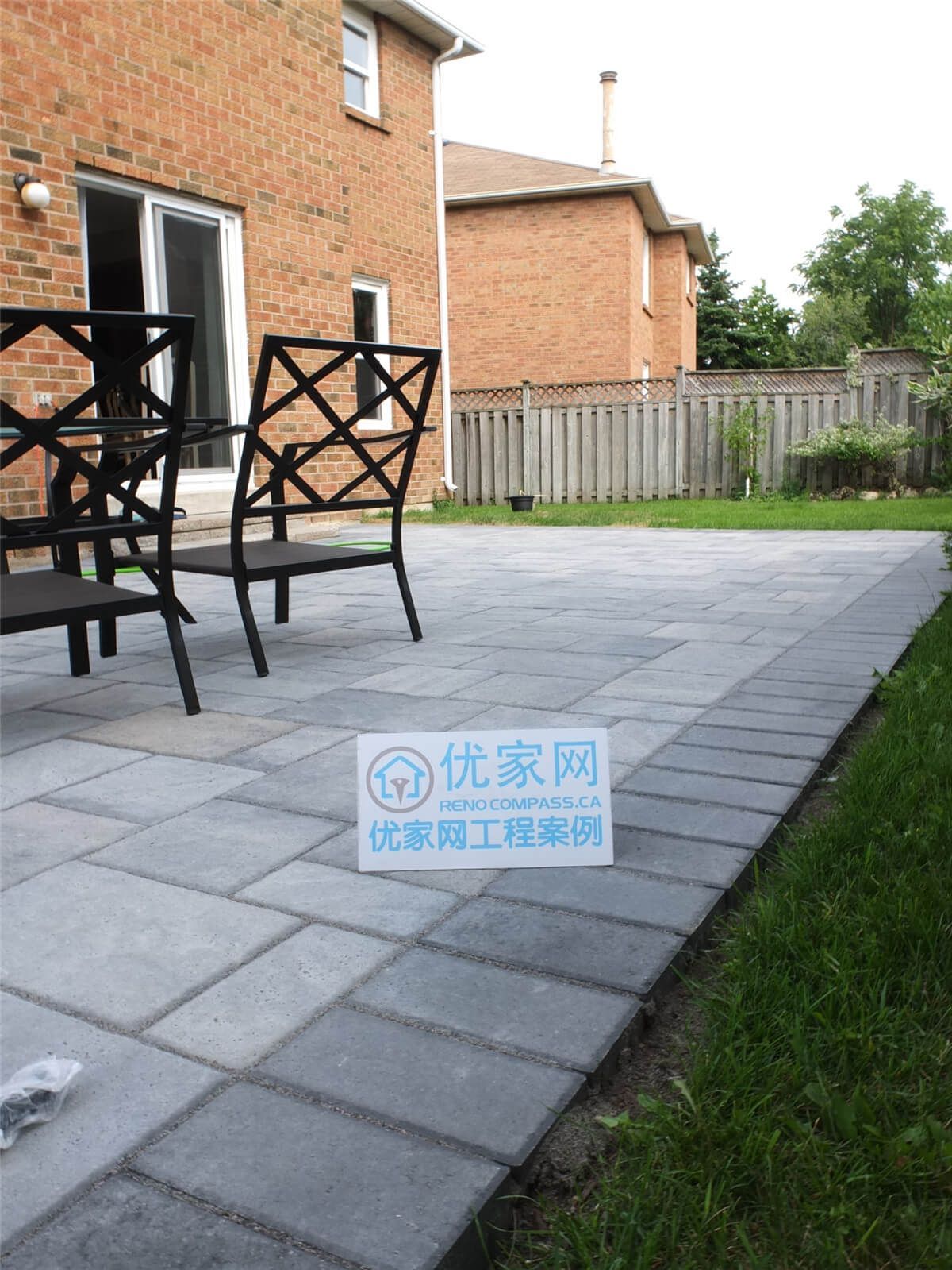 This Toronto backyard landscaping project features a professionally installed interlocking stone patio with a clean, modern layout. The new outdoor space provides a durable and stylish seating area, surrounded by refreshed lawn and greenery for a functional and inviting backyard environment. Completed by Reno Compass, this project highlights quality craftsmanship in patio construction and garden landscaping for Toronto homeowners seeking beautiful and low-maintenance outdoor living spaces.
