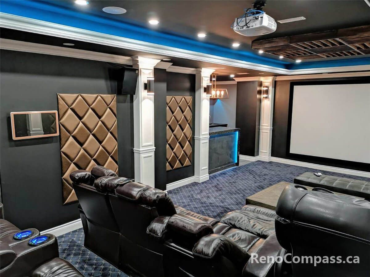This image presents a luxury home theater room featuring a large projection screen, tiered leather seating, recessed ceiling lighting, and a professionally designed layout for an immersive cinematic experience.