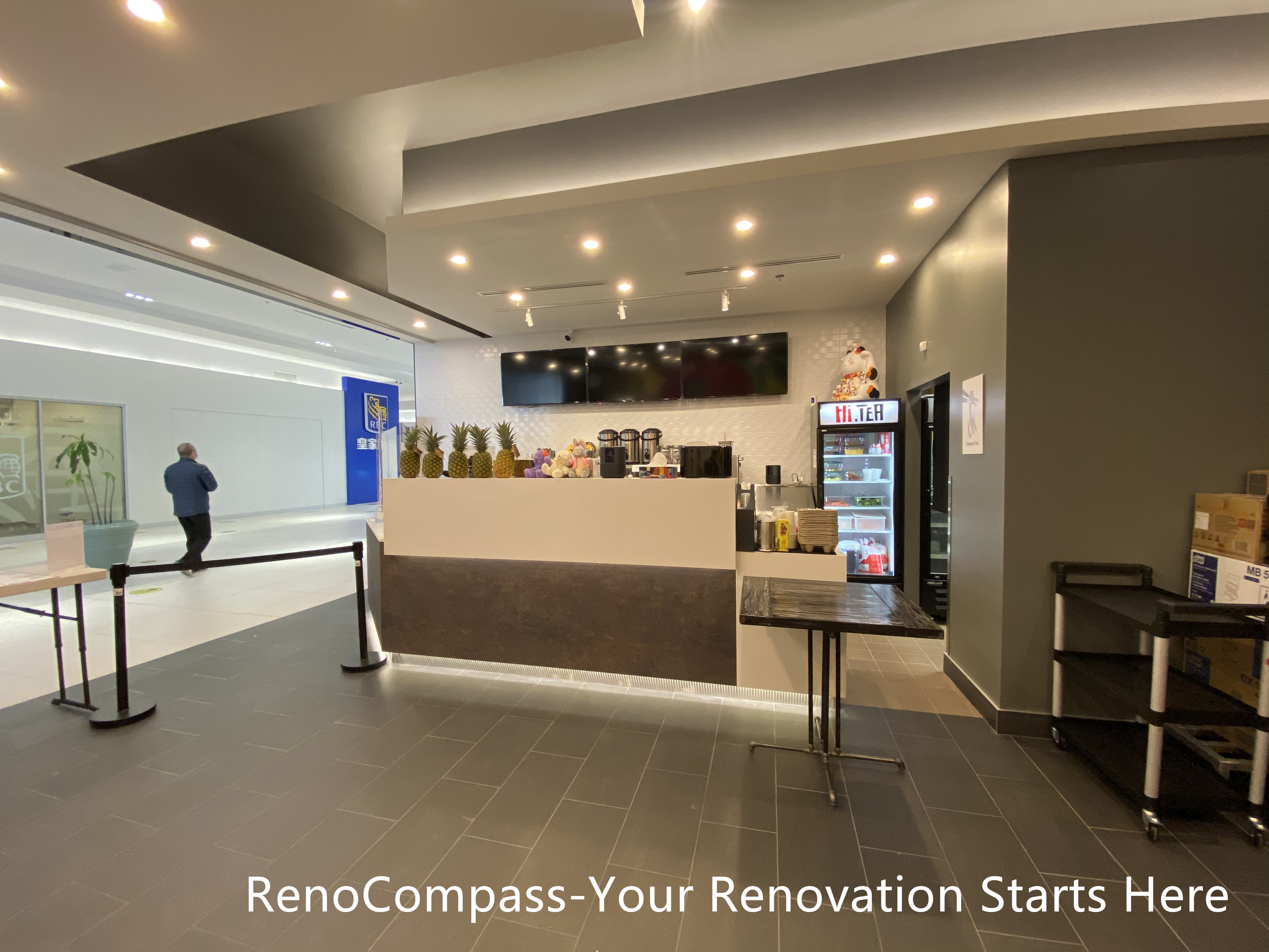Restaurant renovation in Toronto showcasing a custom-built service counter, clean modern finishes, recessed ceiling lighting, and functional commercial layout. This project by Reno Compass Inc. focuses on efficient customer flow, durable flooring, and a bright, welcoming front-of-house environment for high-traffic restaurant spaces.