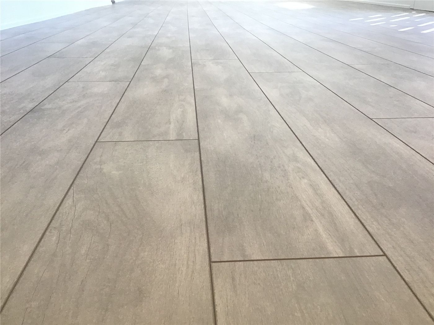 This Markham full home renovation features high-quality wood-look vinyl plank flooring with a realistic grain texture and seamless installation. The durable surface is designed for long-term performance, easy maintenance, and a clean modern aesthetic. Completed by a trusted Toronto Renovation Company, this flooring solution enhances both style and functionality throughout the home.
