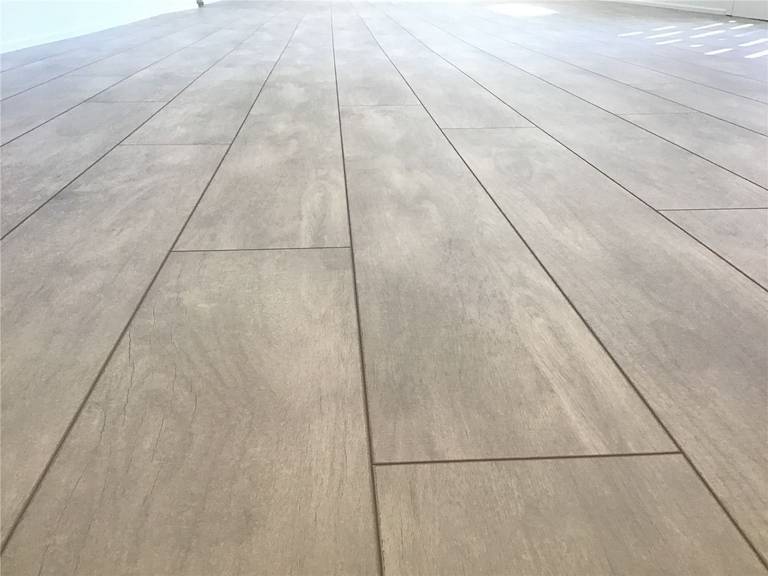 This Markham full home renovation features high-quality wood-look vinyl plank flooring with a realistic grain texture and seamless installation. The durable surface is designed for long-term performance, easy maintenance, and a clean modern aesthetic. Completed by a trusted Toronto Renovation Company, this flooring solution enhances both style and functionality throughout the home.
