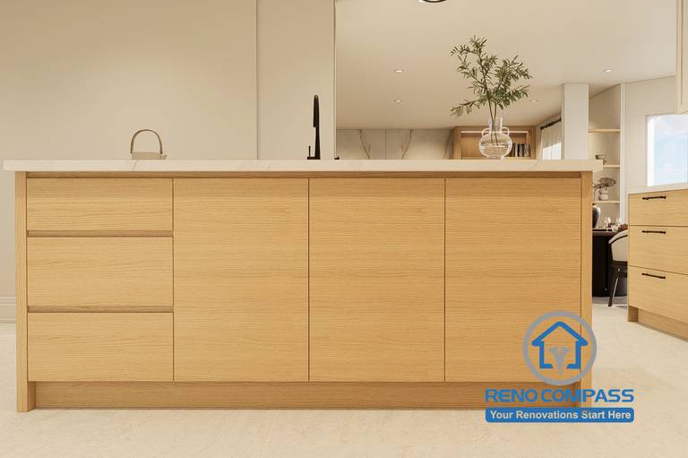 Custom kitchen island design created for a Markham whole home renovation project. Featuring natural wood cabinetry, quartz countertops, integrated storage solutions, and a spacious layout designed to improve functionality, meal preparation, and family gathering experiences within an open-concept living environment.