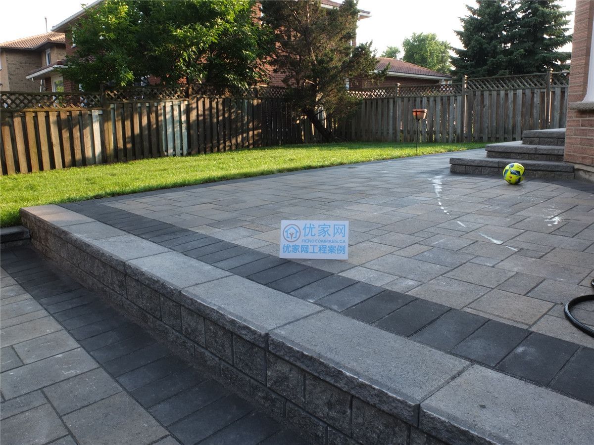 Professional backyard interlocking and retaining wall construction in Markham by a trusted Toronto renovation company. This outdoor renovation features durable stone paving, modern retaining wall design, and a clean layout that enhances both functionality and curb appeal for everyday outdoor living.