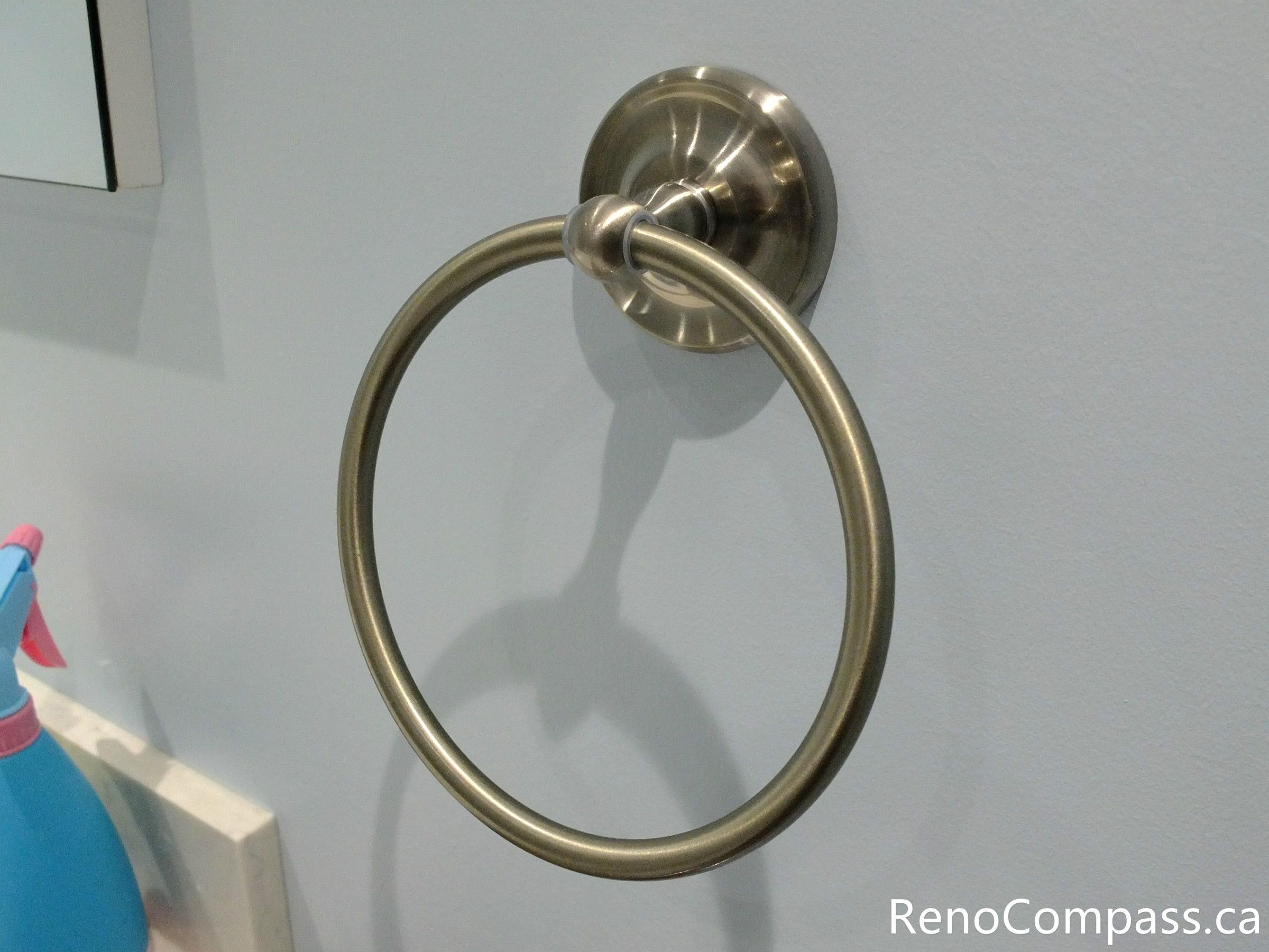 This Richmond Hill bathroom renovation includes modern brushed nickel towel ring installation, adding both functionality and refined detail to the space. Completed by a professional Toronto renovation company, the upgraded bathroom accessories enhance daily convenience while maintaining a clean, coordinated and contemporary design.