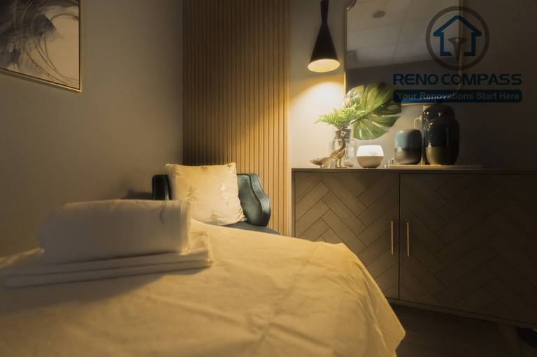 Treatment area designed during a North York beauty salon renovation, featuring efficient workstation spacing, soft lighting