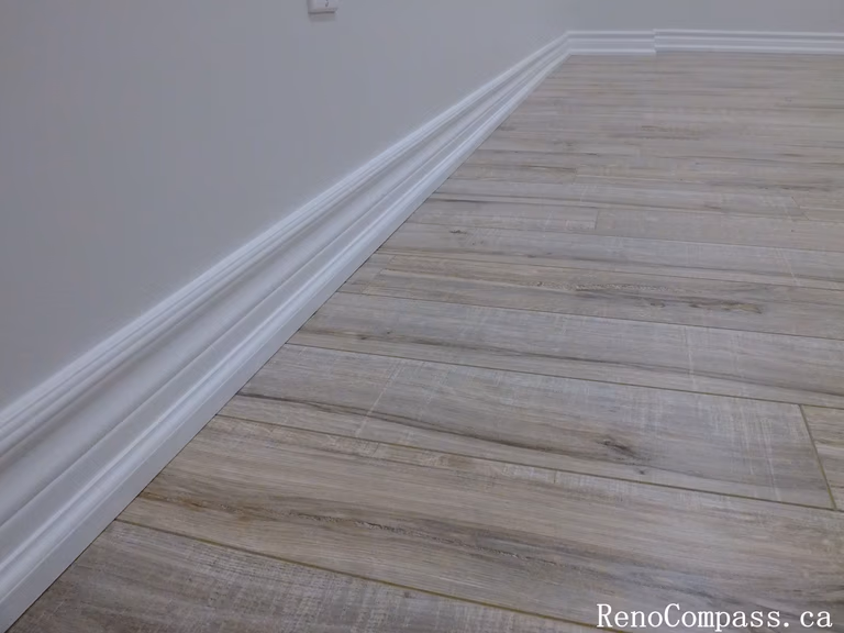 Vinyl Flooring and Baseboard – Richmond Hill Basement Renovation