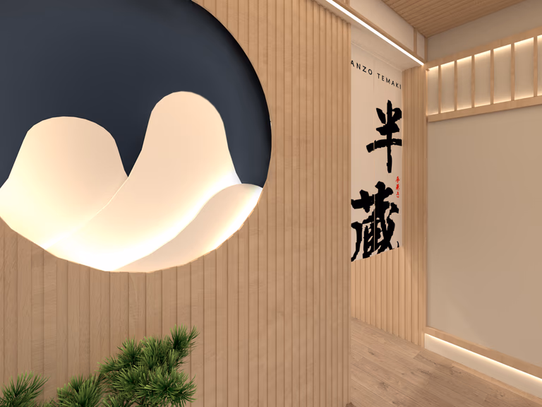 Brand feature wall design for a Markham restaurant, highlighting sculptural logo lighting, vertical wood slat panels, and Japanese calligraphy elements that reinforce brand identity and spatial character.