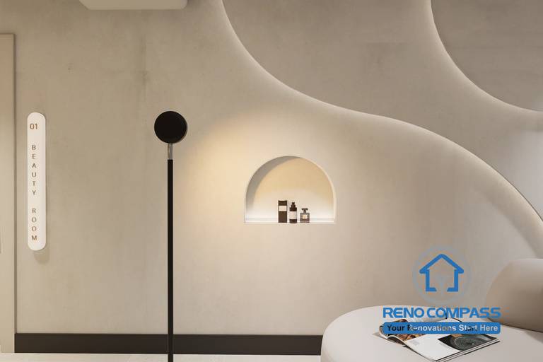 A refined interior detail in a Markham medical aesthetic clinic renovation, featuring soft curved wall design, recessed display niche, and warm ambient lighting to create a calm and premium patient experience.