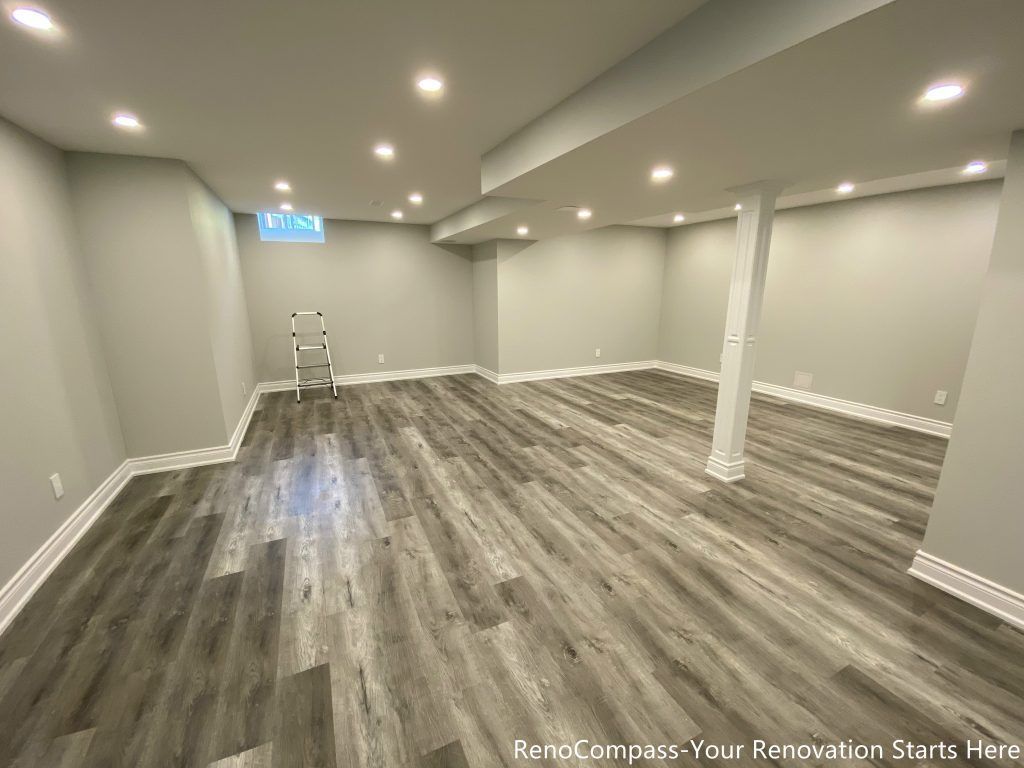This Richmond Hill basement renovation features a clean modern design with high-quality vinyl flooring, smooth ceiling finishing, and recessed pot lights for a bright and spacious feel. Completed by professional Toronto renovation company Reno Compass Inc., the project transforms the basement into a functional and comfortable living space ideal for family use, rental, or entertainment. The neutral wall tones and durable flooring enhance both aesthetics and long-term value.