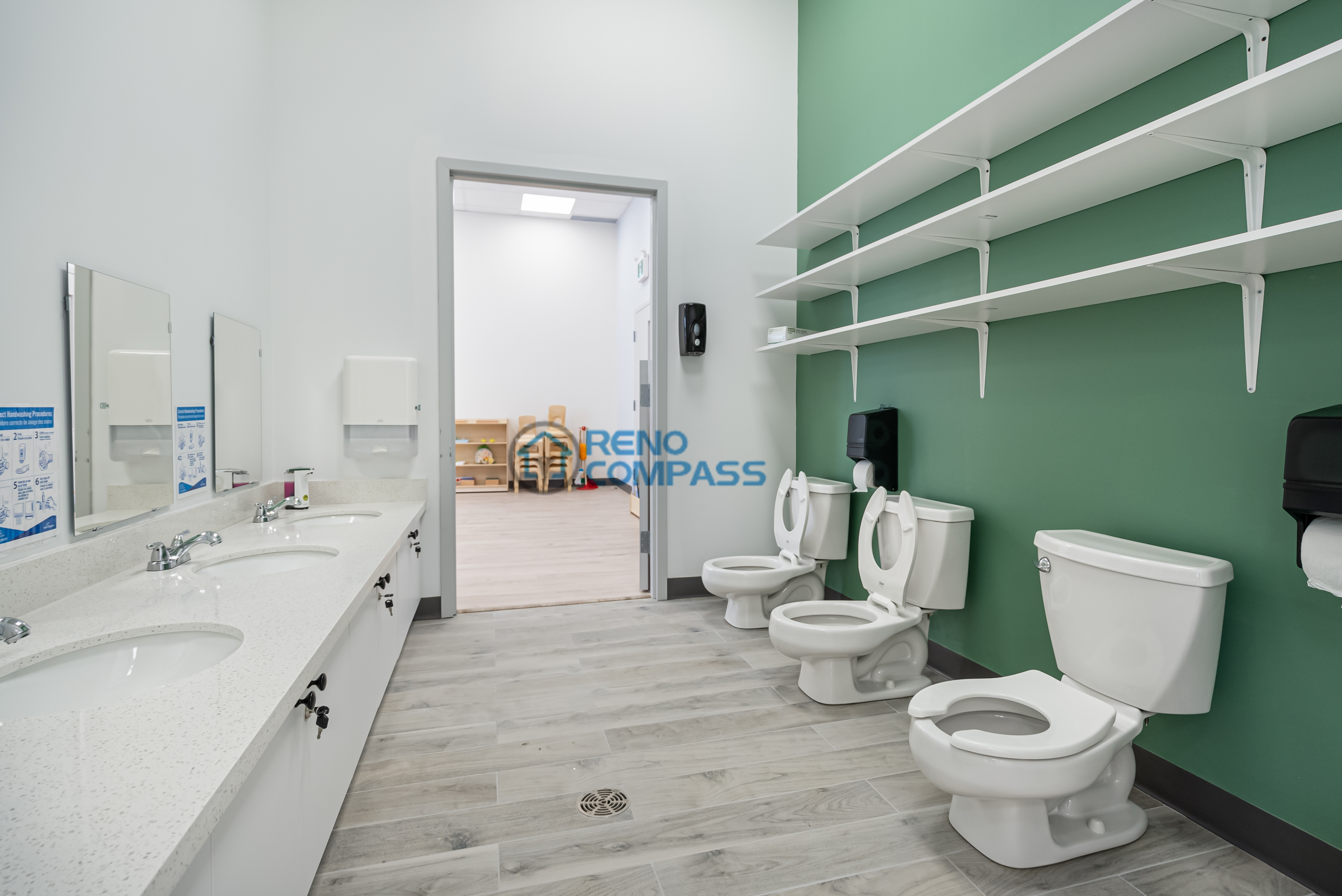 Renovated wash and care area in a Richmond Hill daycare, designed with easy-clean surfaces, practical storage, and a safe layout suitable for daily childcare use.