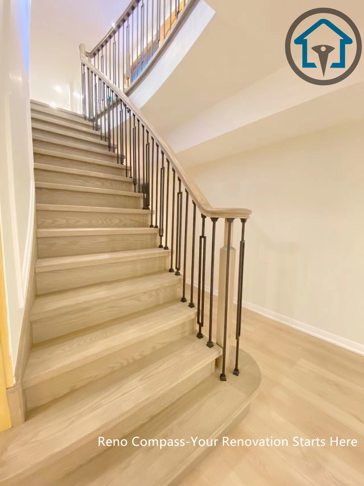 This image showcases the renovated staircase in a North York house, featuring light-toned wood steps paired with custom black metal balusters. The redesign improves safety, visual continuity, and flow between floors, while enhancing the overall brightness and architectural character of the home.