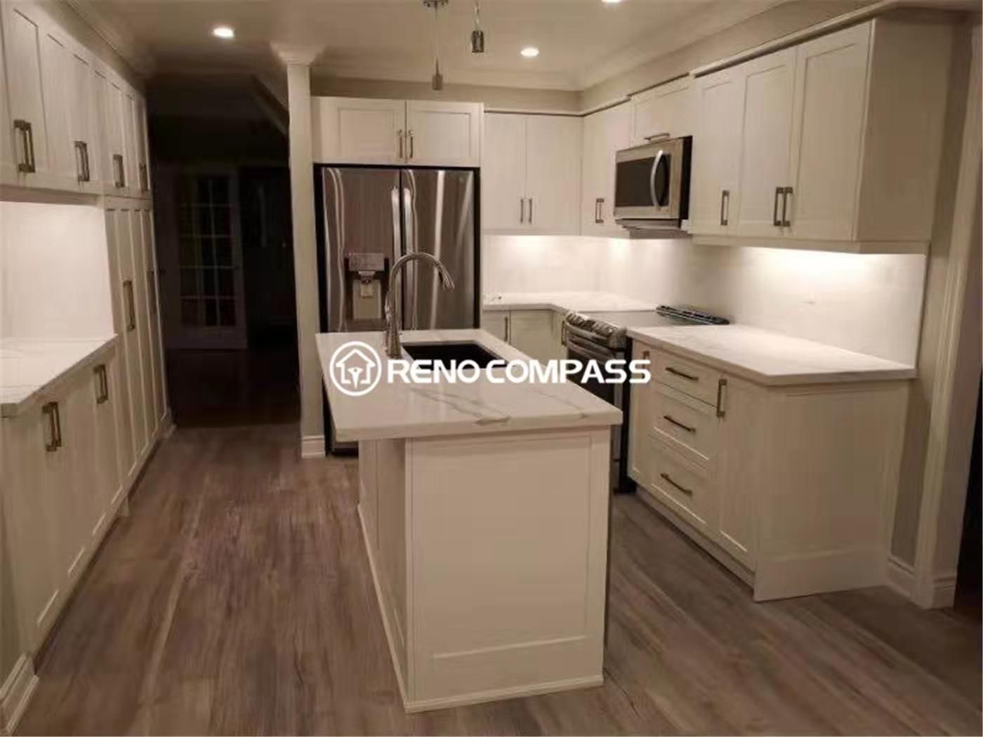 This modern kitchen renovation project in Mississauga features custom white shaker cabinets, quartz countertops, and a functional central island designed for everyday cooking and entertaining. Completed by a professional Toronto renovation company, the space combines clean cabinetry lines, upgraded lighting, and durable flooring to create a bright and highly functional kitchen environment. Stainless steel appliances, ample storage solutions, and a practical layout enhance both visual appeal and daily usability, delivering a timeless and elegant kitchen transformation for modern family living.