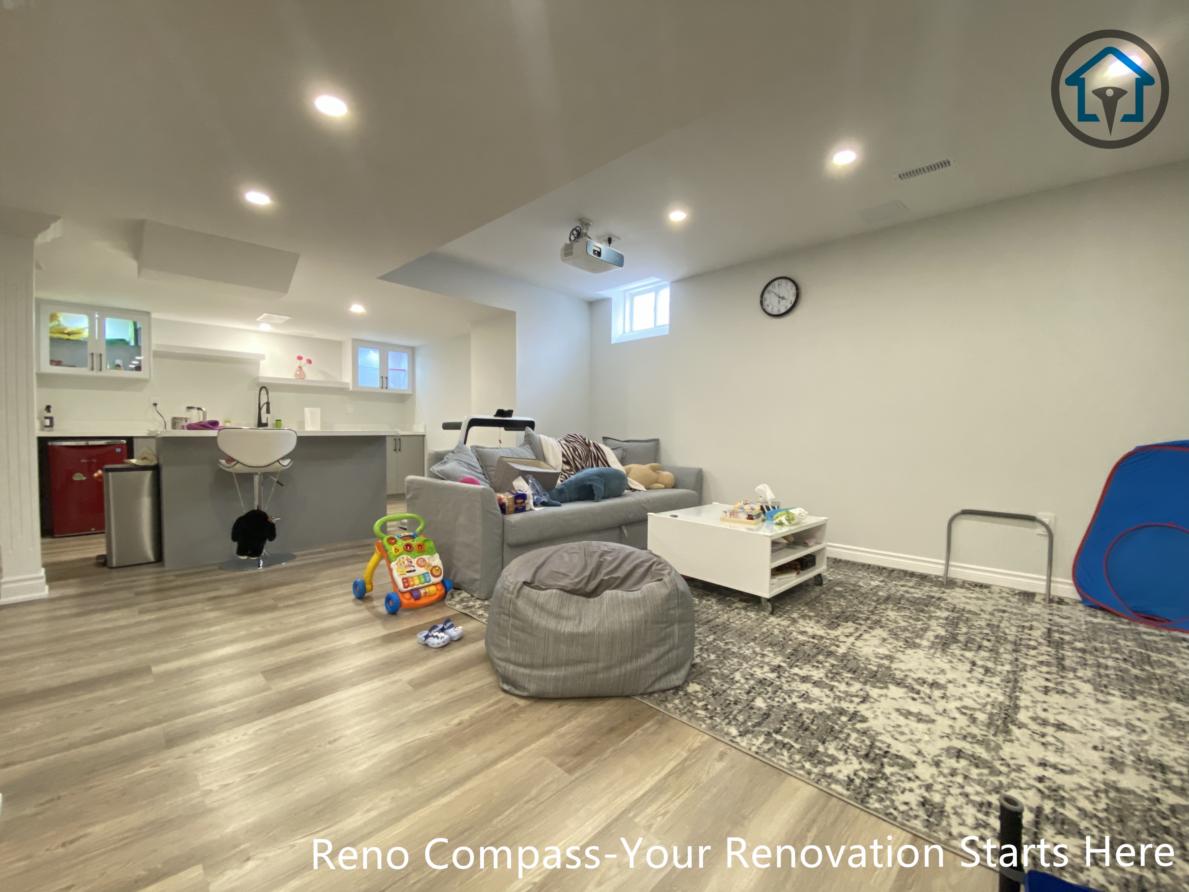 Renovated basement living area in Vaughan featuring modern finishes, balanced lighting, and a comfortable open-concept layout.