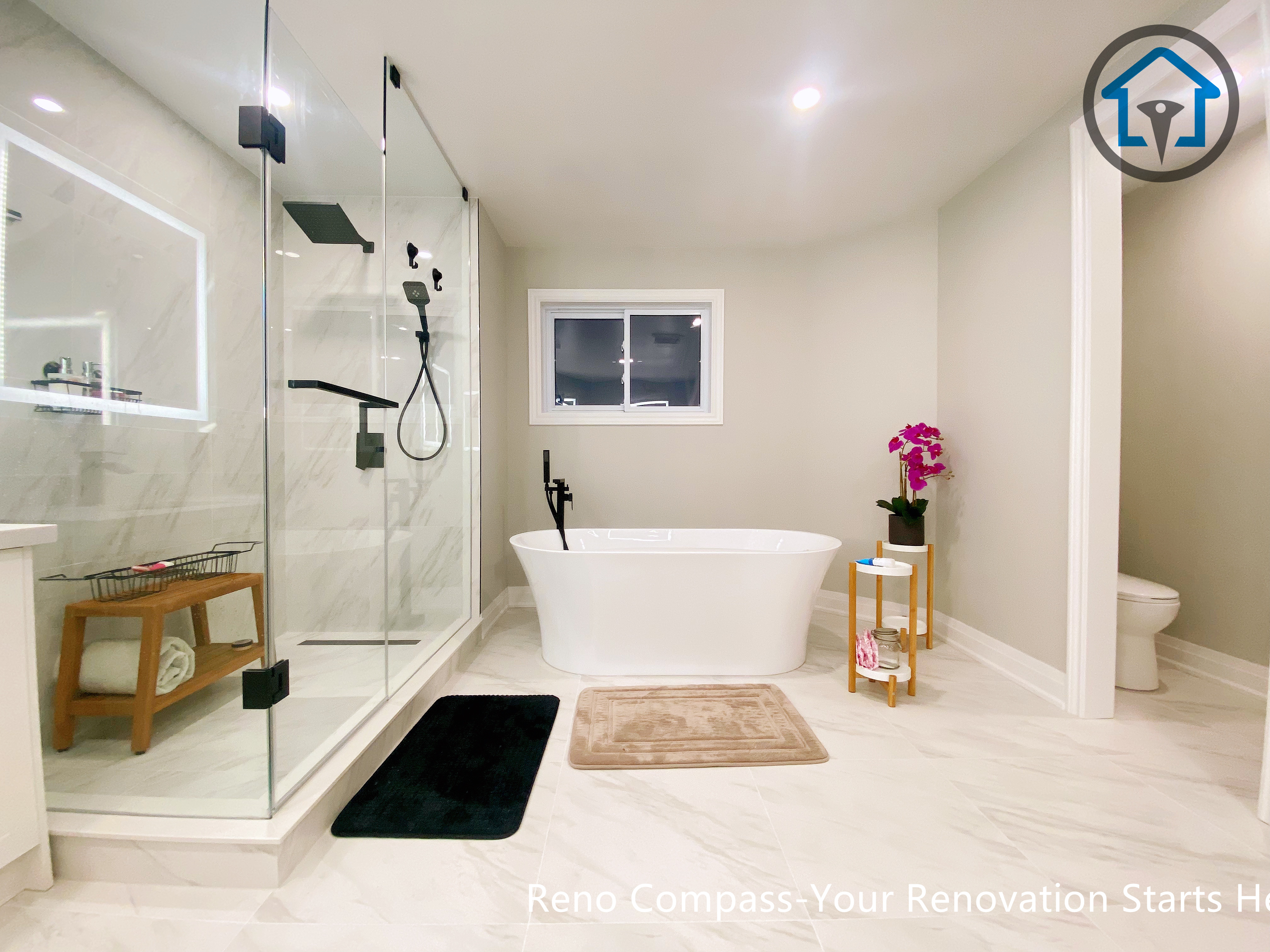 Overall layout view of a Newmarket bathroom renovation showcasing an open, bright design with practical zoning for daily use and long-term accessibility.