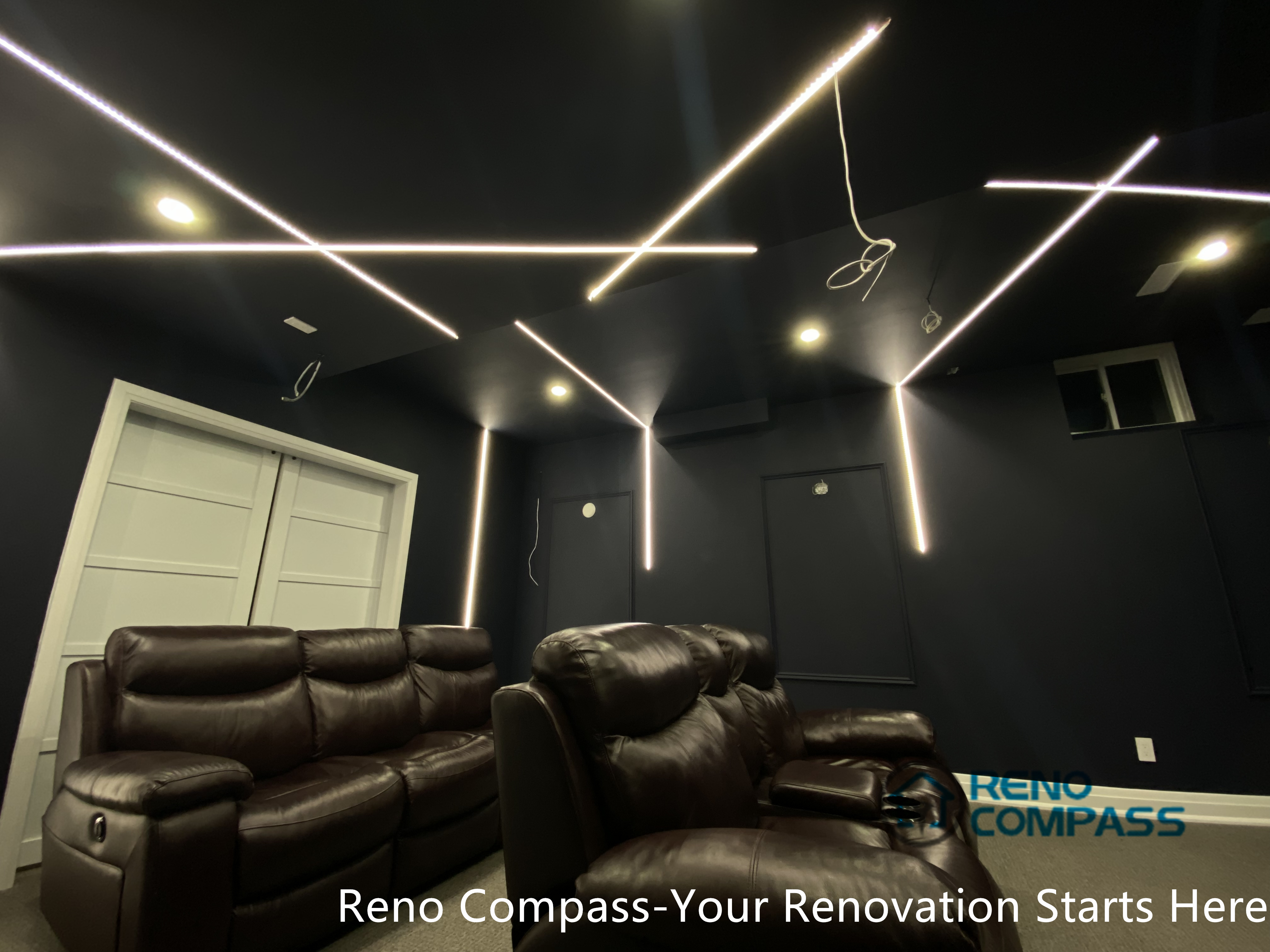 This Newmarket basement home theater renovation features a modern dark-tone design with custom recessed LED ceiling lighting, acoustic wall panels, and a dedicated media seating layout. Designed and built by an experienced Toronto renovation company, this basement transformation delivers a cinematic atmosphere while maintaining comfort, clean lines, and functional lighting control—ideal for family entertainment and private movie nights.