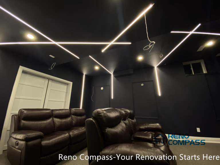 This Newmarket basement home theater renovation features a modern dark-tone design with custom recessed LED ceiling lighting, acoustic wall panels, and a dedicated media seating layout. Designed and built by an experienced Toronto renovation company, this basement transformation delivers a cinematic atmosphere while maintaining comfort, clean lines, and functional lighting control—ideal for family entertainment and private movie nights.