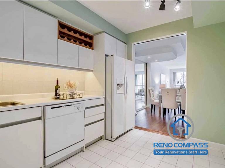 This outdated Toronto kitchen features original cabinetry, tile flooring, and a closed layout. The space lacked modern storage solutions and contemporary design, making it ideal for a full kitchen renovation transformation.
