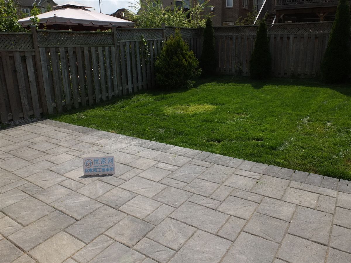 This image showcases a completed backyard interlock patio landscaping project in Markham. High-quality interlocking pavers were professionally installed to create a clean, durable outdoor patio area that integrates seamlessly with the lawn, enhancing both functionality and curb appeal for residential outdoor spaces.