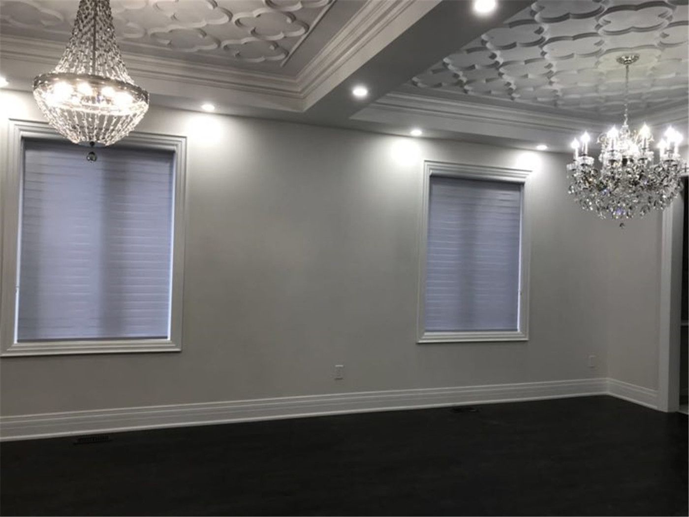 Minimalist interior in a Toronto home featuring clean window blinds installation. The design offers effective light control and privacy while maintaining a sleek and uncluttered modern space.