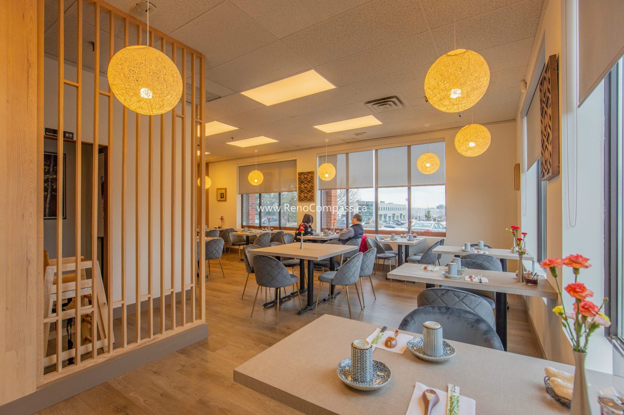 This Richmond Hill Chinese restaurant renovation completed by Toronto renovation company Reno Compass Inc. showcases a bright and modern dining space designed for comfort and efficiency. The upgraded interior features warm wood flooring, custom wall finishes, elegant pendant lighting, and contemporary seating arrangements that enhance the overall dining experience. With a carefully planned layout and refined aesthetic details, the renovation creates a welcoming atmosphere for guests while improving functionality and flow for daily restaurant operations.