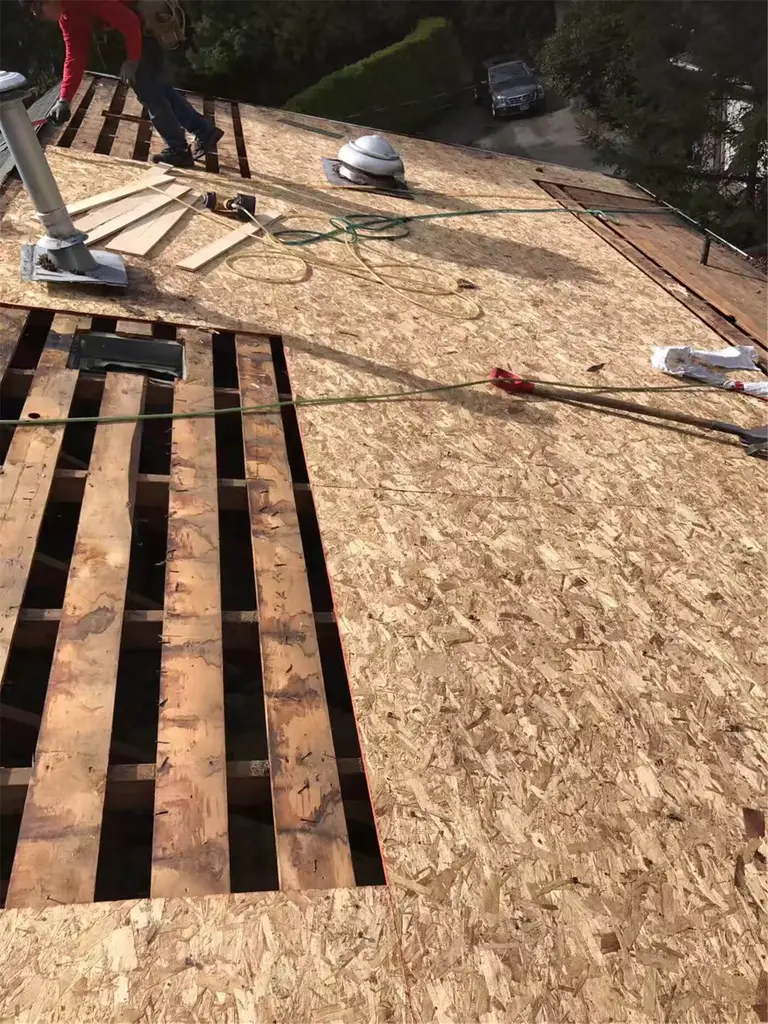 Roof replacement project in Toronto showing the complete removal of the old roofing system and exposed roof deck for structural inspection. Damaged sections were identified and prepared for plywood replacement to ensure a solid and level base for the new roofing materials. Proper deck inspection and repair are critical steps in extending roof lifespan and preventing future leaks.
Completed by an experienced Toronto roofing contractor following safety and building code requirements.