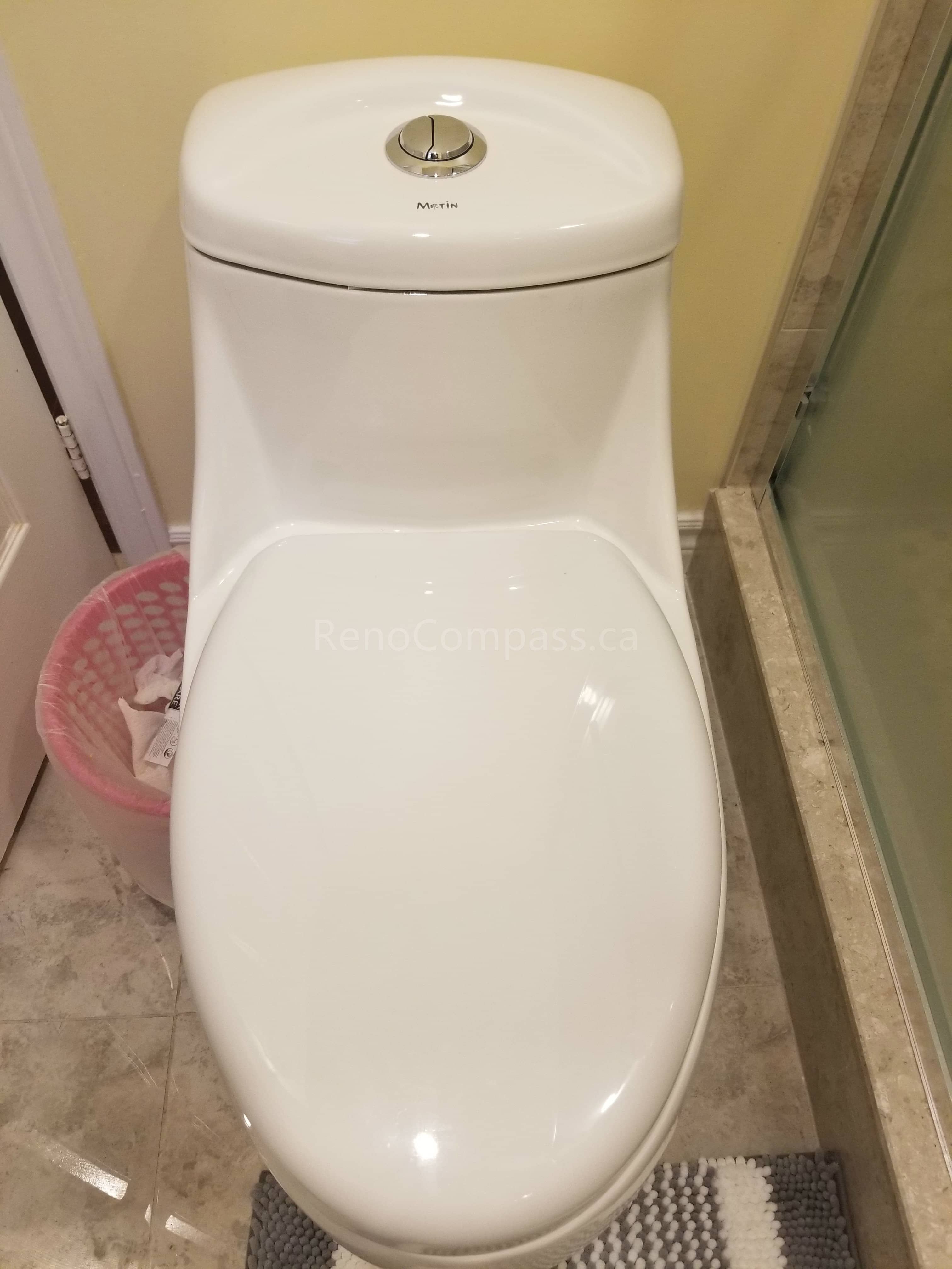 This Markham bathroom renovation includes the installation of a modern one-piece toilet that enhances both comfort and efficiency. The sleek design offers easy maintenance, improved water efficiency, and a clean contemporary look that complements the newly renovated shower, vanity, and floor tiles. As part of a full bathroom upgrade, this installation ensures long-lasting performance and a refreshed, functional space for everyday use.
