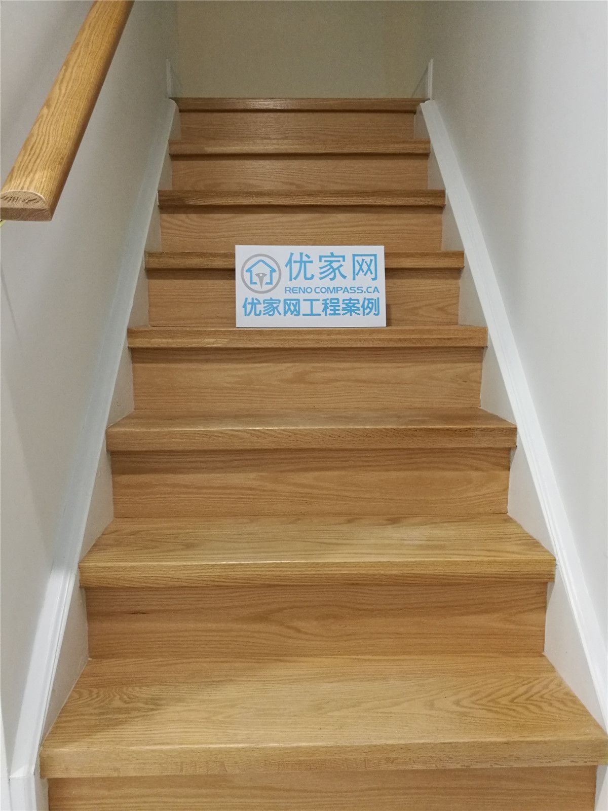 This image showcases a newly upgraded staircase completed as part of a Vaughan basement renovation project. The staircase features solid wood steps with a warm natural finish, clean white risers, and a sturdy handrail that enhances both safety and visual appeal. The simple yet elegant design creates a smooth transition between levels while maintaining a modern and timeless aesthetic.

Precise installation and detailed finishing ensure durability and long-term performance in this high-traffic area of the home. Completed by a trusted Toronto Renovation Company, this staircase renovation enhances accessibility, comfort, and overall basement design continuity while adding lasting value to the property.