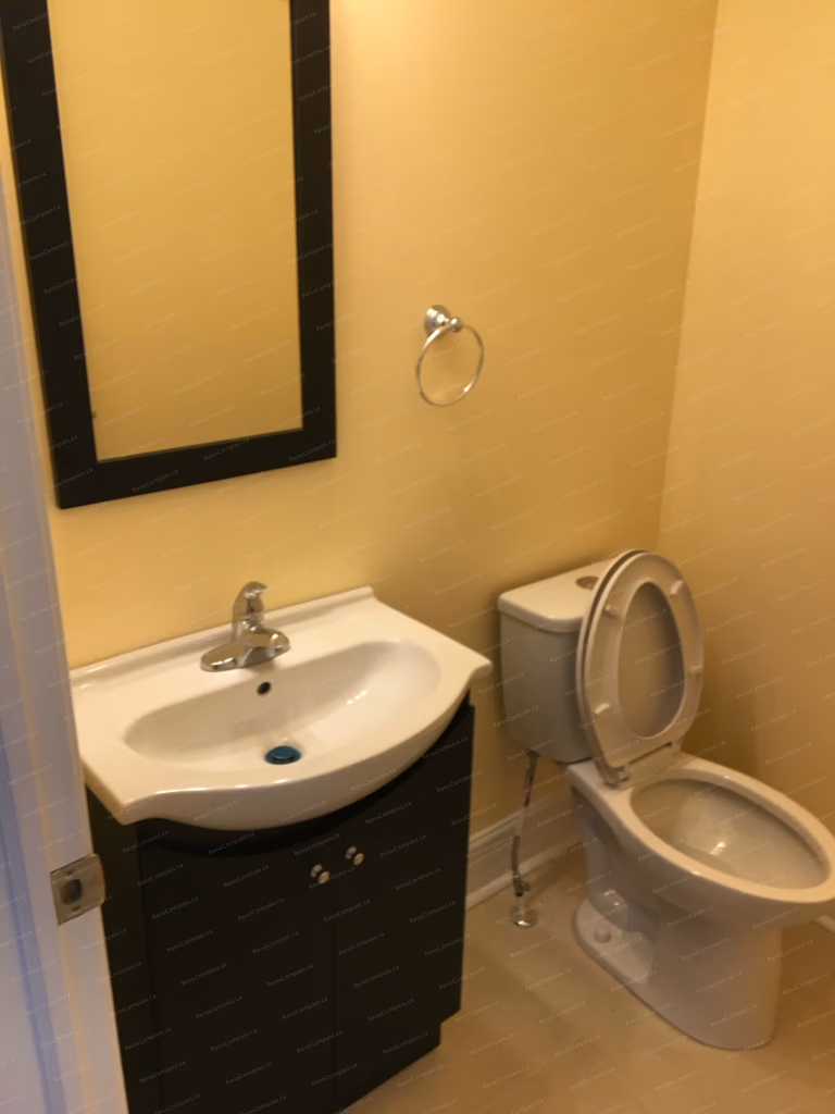 This Markham interior renovation features a clean and functional bathroom upgrade with a compact modern vanity, updated toilet installation, and fresh wall finishes. The improved layout enhances comfort and practicality while maintaining a simple, contemporary style. Completed by Reno Compass, a trusted Toronto renovation company specializing in bathroom and interior home renovations.