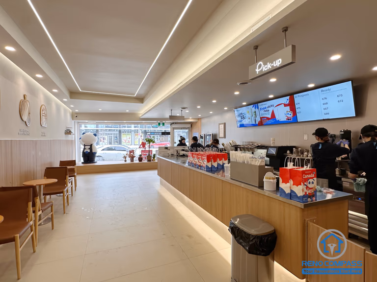 This North York bubble tea shop interior renovation showcases a modern commercial layout with upgraded lighting, custom seating area, and an efficient service counter design. Completed by a professional Toronto renovation company, the space is optimized for smooth workflow, high customer volume, and a clean, welcoming retail environment ideal for busy beverage shops and café operations.