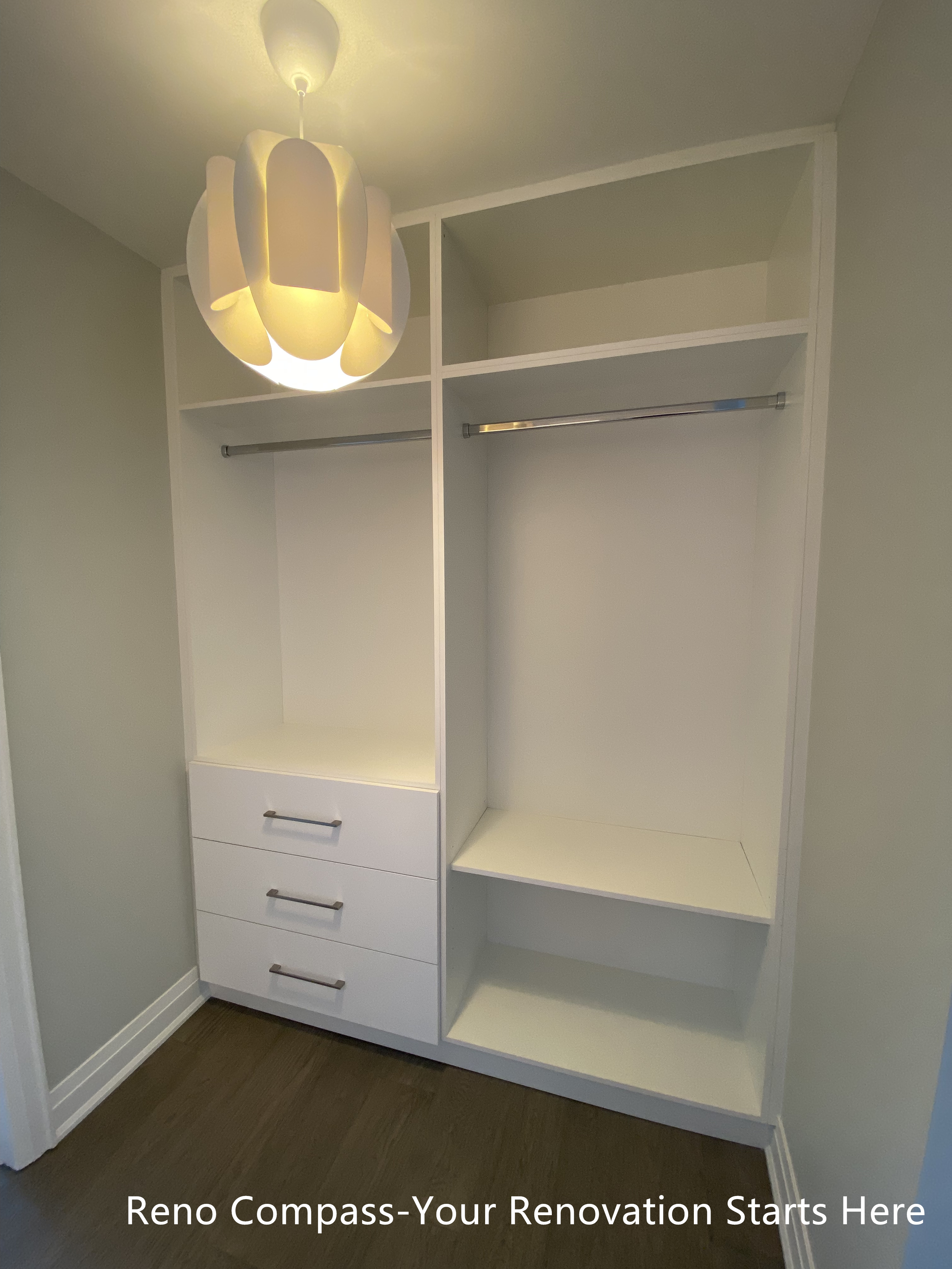 Custom walk-in closet featured in an Oakville interior renovation, showcasing built-in shelving, hanging rods, and integrated drawer storage for optimal organization. The clean white cabinetry and functional layout provide a modern storage solution designed and completed by a professional Toronto renovation company.
