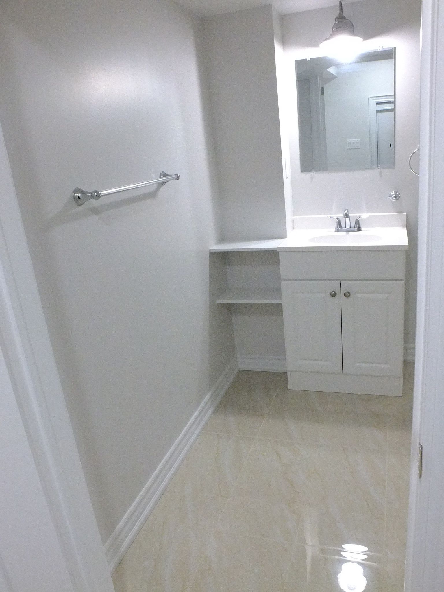 This image presents the completed basement living area after renovation in Richmond Hill. The improved layout, light finishes, and durable flooring create a flexible space suitable for family use, a home office, or guest accommodation. The project was delivered by an experienced Toronto renovation company focused on long-term value.