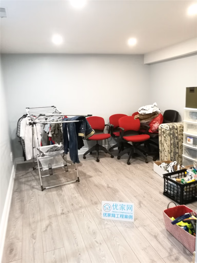 This image shows a finished multi-purpose room completed as part of a North York interior renovation. The space features durable vinyl plank flooring, recessed pot lighting, and neutral wall finishes, making it suitable for storage, workspace, or flexible household use. The open layout allows for practical organization while maintaining a clean, bright environment. This renovation reflects the quality workmanship of a professional Toronto renovation company serving the North York area.