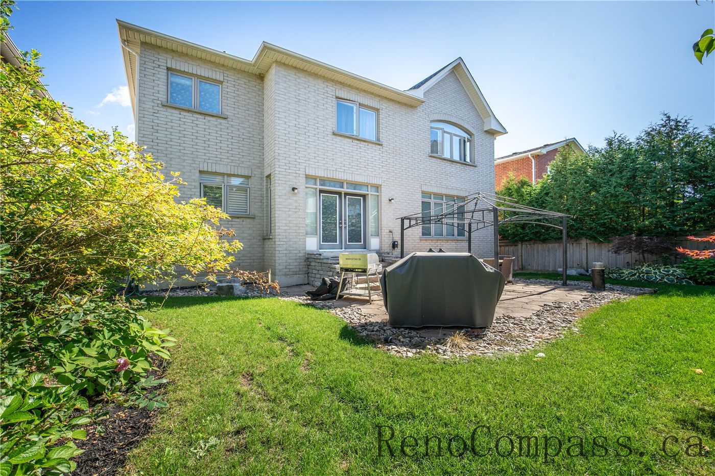 This Richmond Hill entire house renovation includes exterior and backyard improvements that enhance outdoor living and property value. The upgraded home exterior, patio area, and landscaping complement the complete interior renovation completed by a trusted Toronto renovation company, delivering a cohesive full-home transformation from inside to outside.