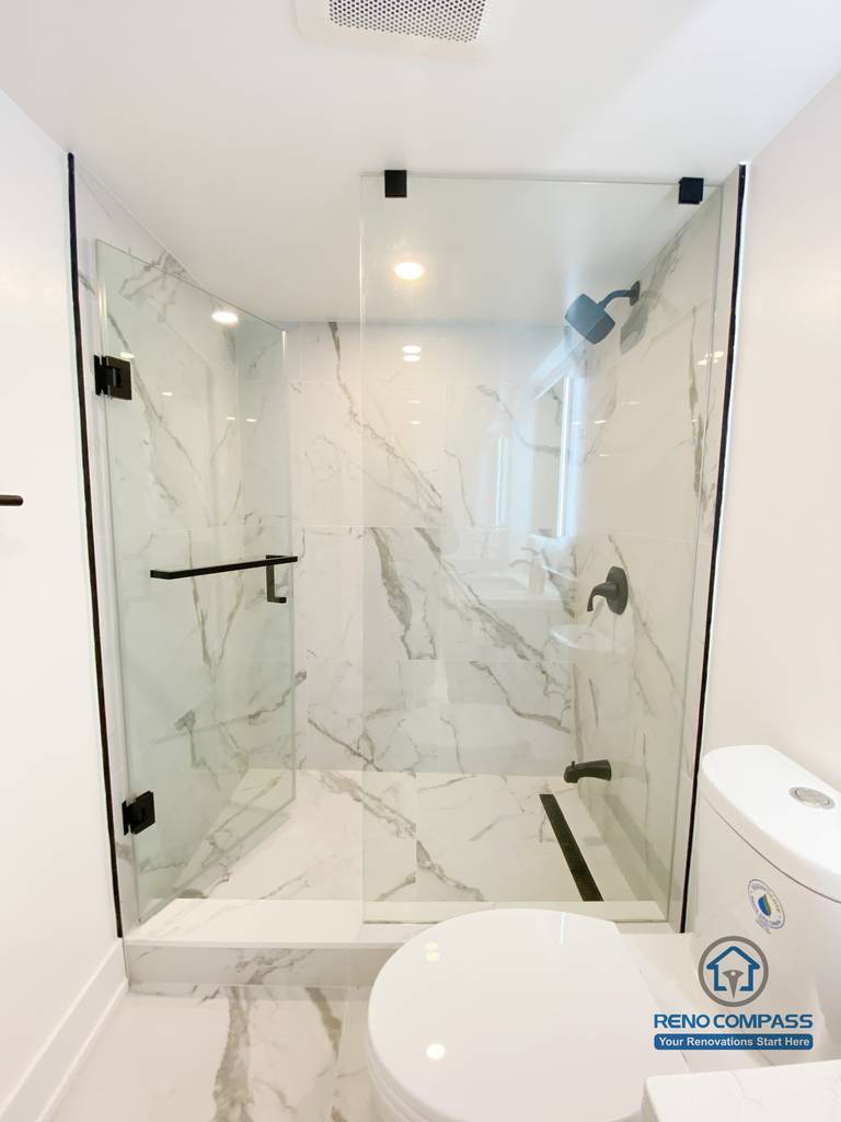 This basement shower room is part of a modern basement renovation project located in Markham, Greater Toronto Area. Featuring a walk-in glass shower, contemporary fixtures, and clean tile finishes, the design emphasizes functionality, durability, and a sleek modern aesthetic. The renovation enhances everyday comfort while adding value to the basement living space, completed by a professional Toronto Renovation Company.