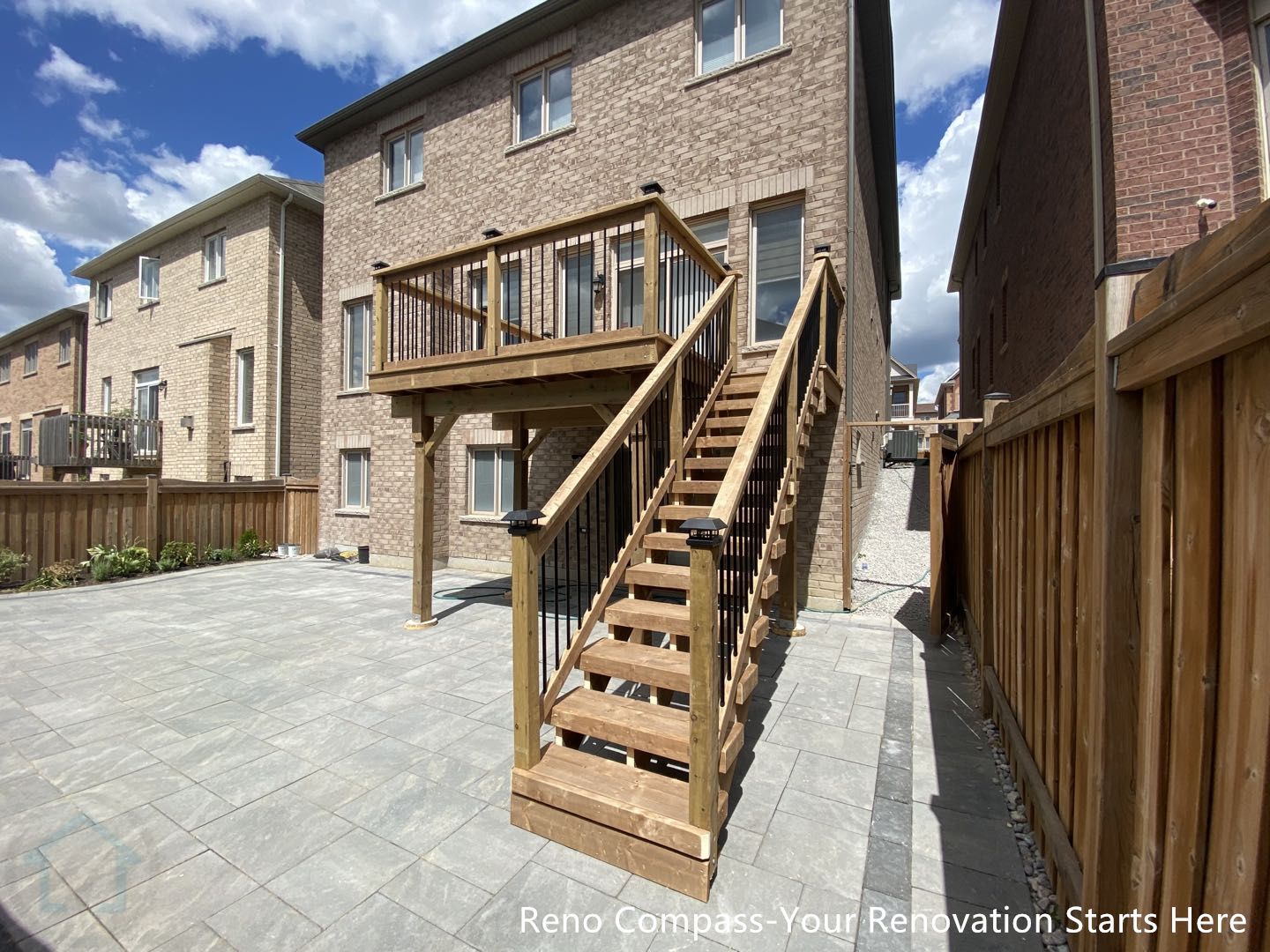This Markham outdoor renovation showcases a complete backyard transformation featuring a large interlocking stone patio paired with a custom-built raised wooden deck and staircase. The spacious patio provides a durable, low-maintenance surface suitable for seating and outdoor gatherings, while the elevated deck offers direct access from the home and an additional outdoor living area. The wooden staircase creates a clear, functional connection between levels, improving circulation and usability across the backyard. Balanced proportions, clean transitions, and coordinated materials ensure long-term performance and a cohesive outdoor layout. This deck and patio project was completed by Reno Compass, serving homeowners in Markham and throughout the GTA.