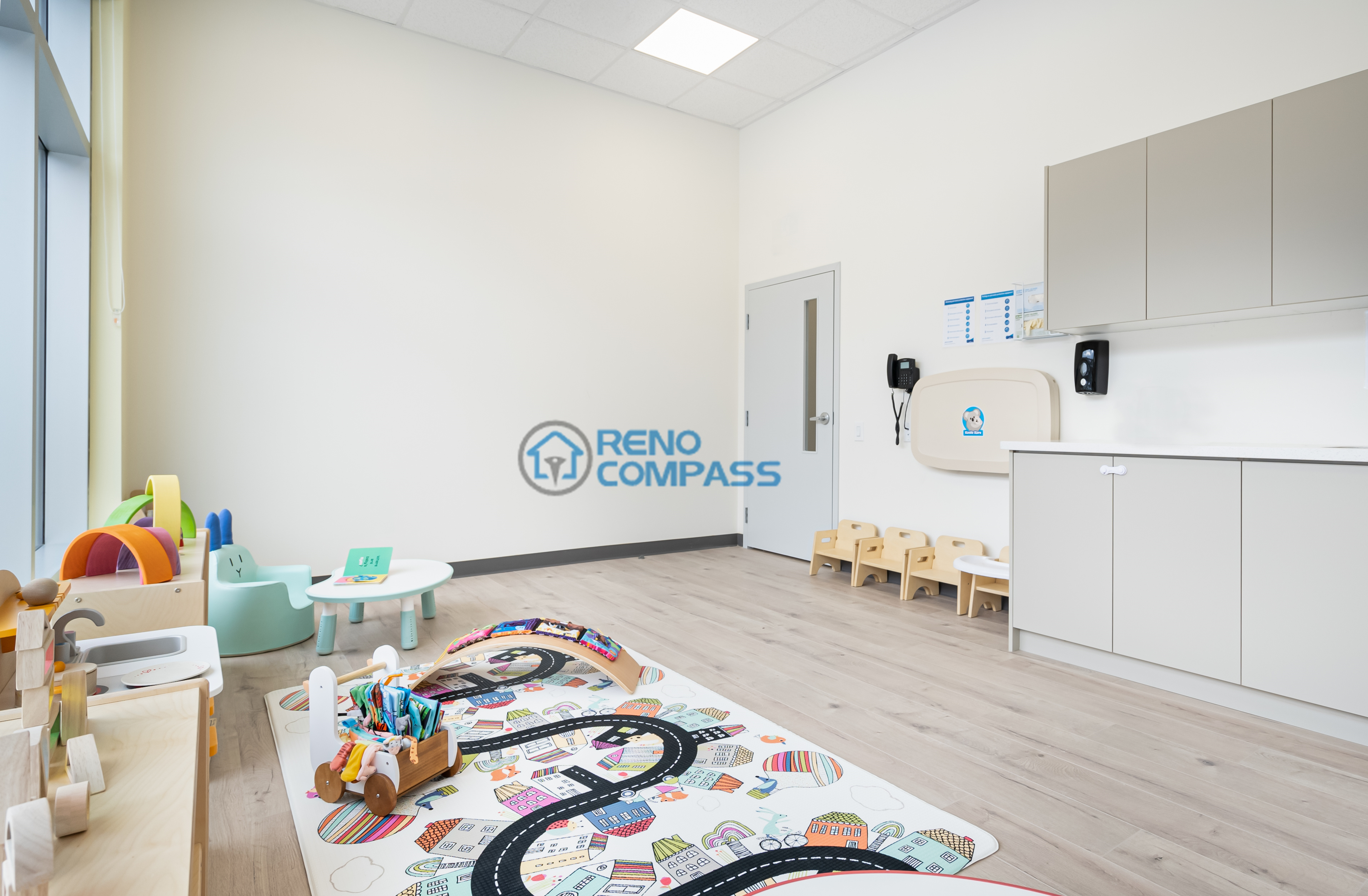 Renovated daycare activity area in Richmond Hill designed with open circulation, clear zoning, and safety-focused materials for flexible learning and play.