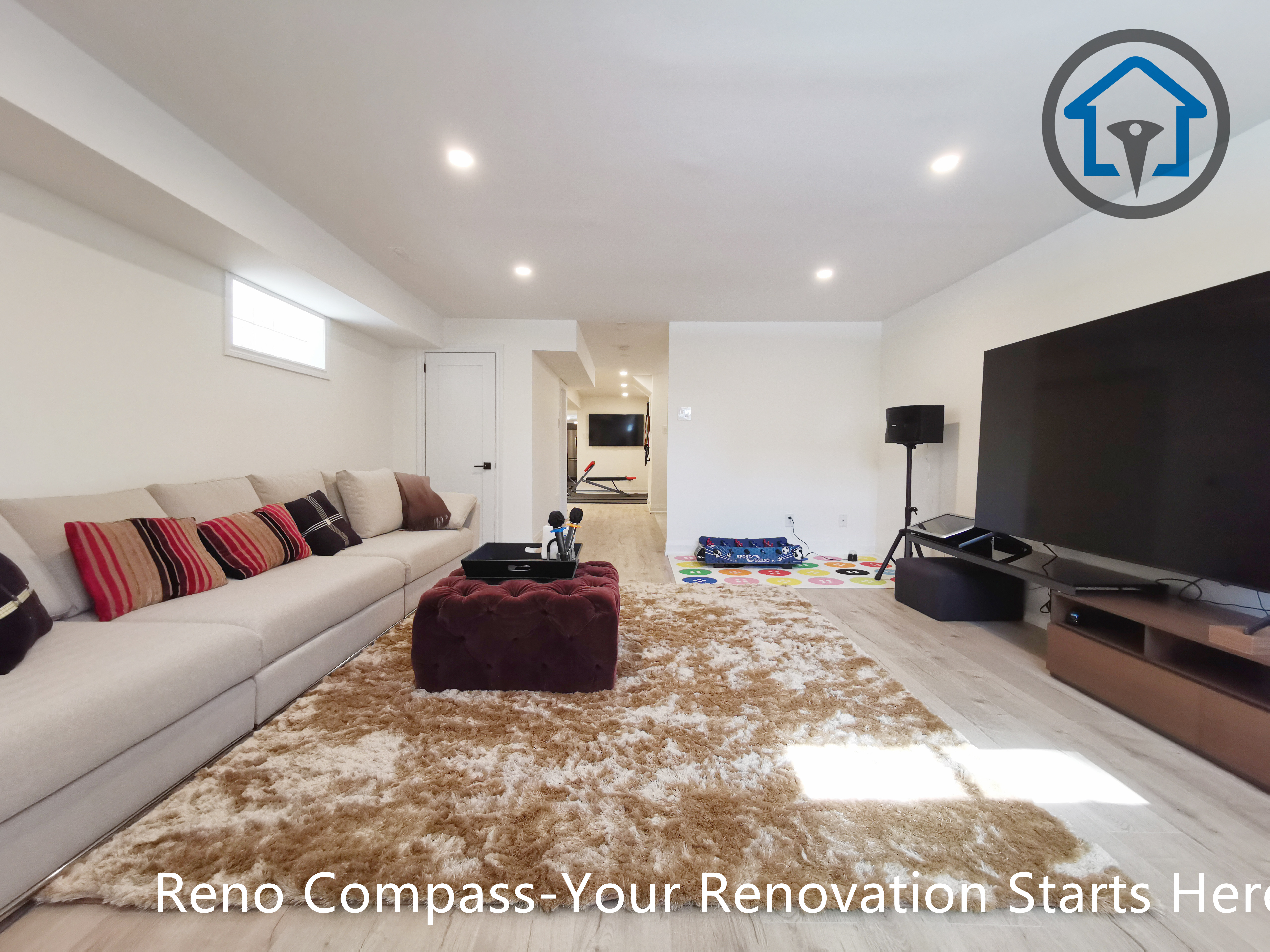 This North York basement renovation features a spacious family entertainment and media room designed for relaxation and recreation. The open layout, recessed ceiling lighting, and light-toned flooring create a bright and comfortable atmosphere, making the space ideal for movie nights, games, and everyday family use. Completed by a Toronto renovation company focused on functional basement design and quality craftsmanship.