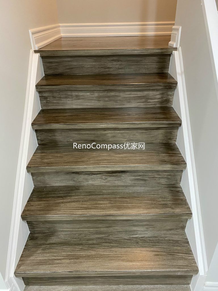 Richmond Hill basement staircase designed with durable wood finishes and smooth trim detailing. Reno Compass blended practicality and modern aesthetics to create a seamless transition between floors.